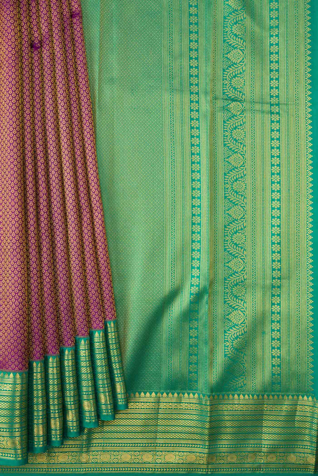 Pleats and pallu of Purple Dual Tone Kanchipuram Saree with Zari Brocade on the body and Zari Border