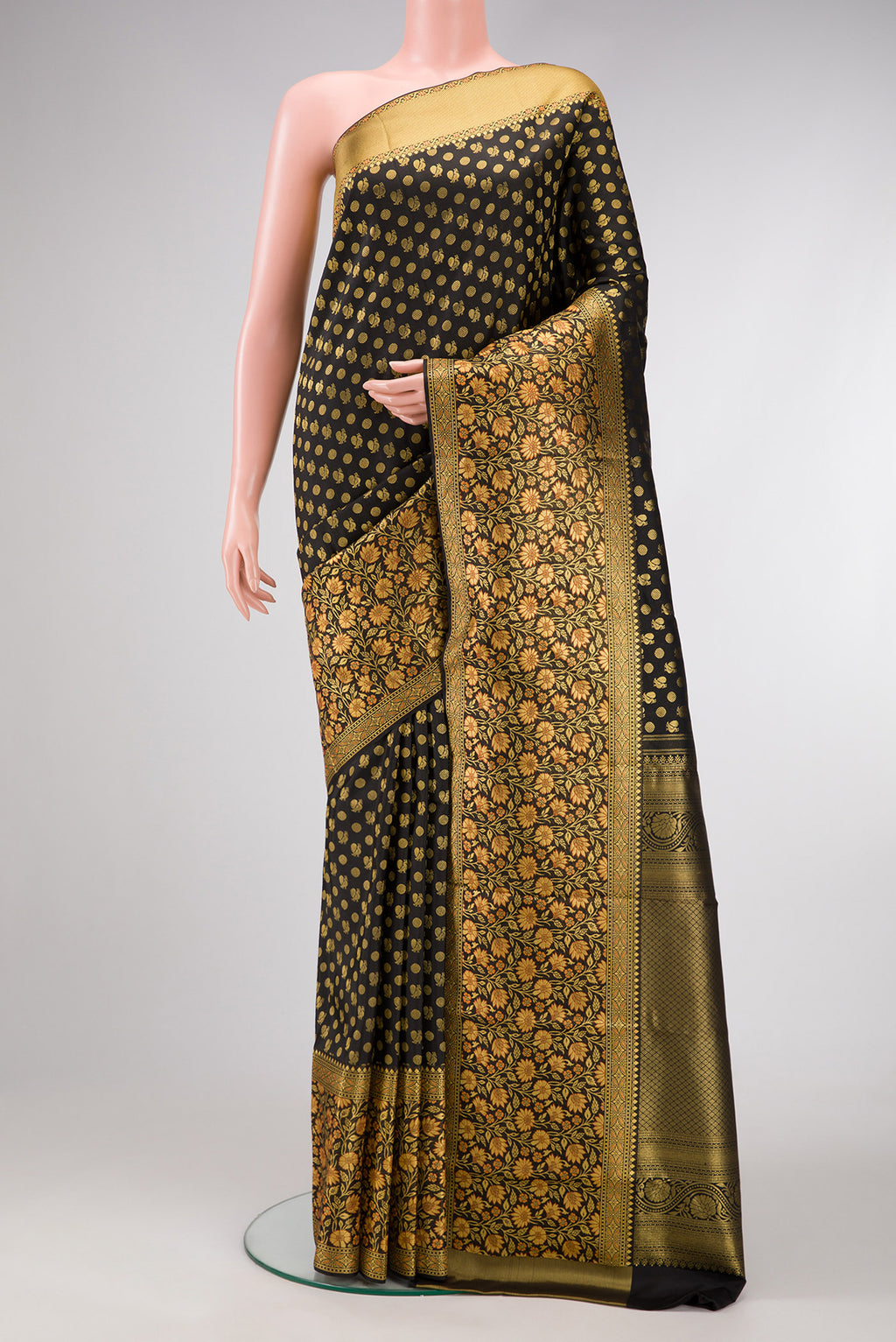 Black Dual Tone Kanjivaram Silk Saree with Zari Brocade on the body and Fancy Border.  displayed on a mannequin