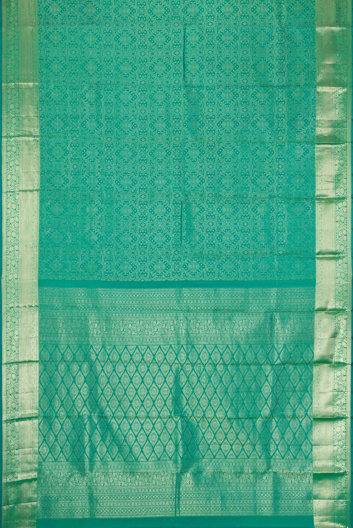 Flat view of Green Dual Tone Kanchipuram Silk Saree with Zari Brocade on the body and Zari Border. 
