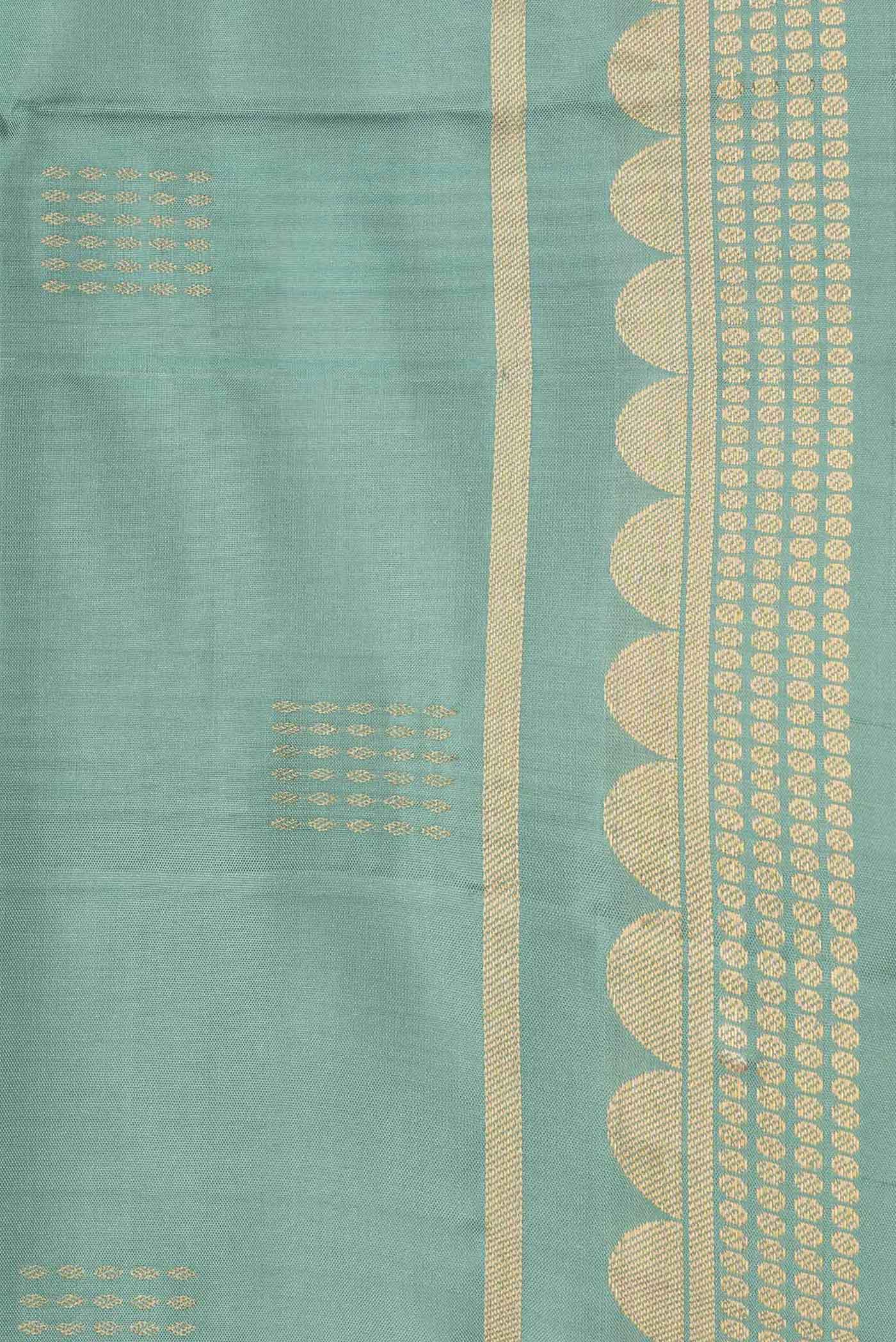 Border image of Sea Green Dual Tone Soft Silk Saree with Zari Butta on the body and Zari Border. 