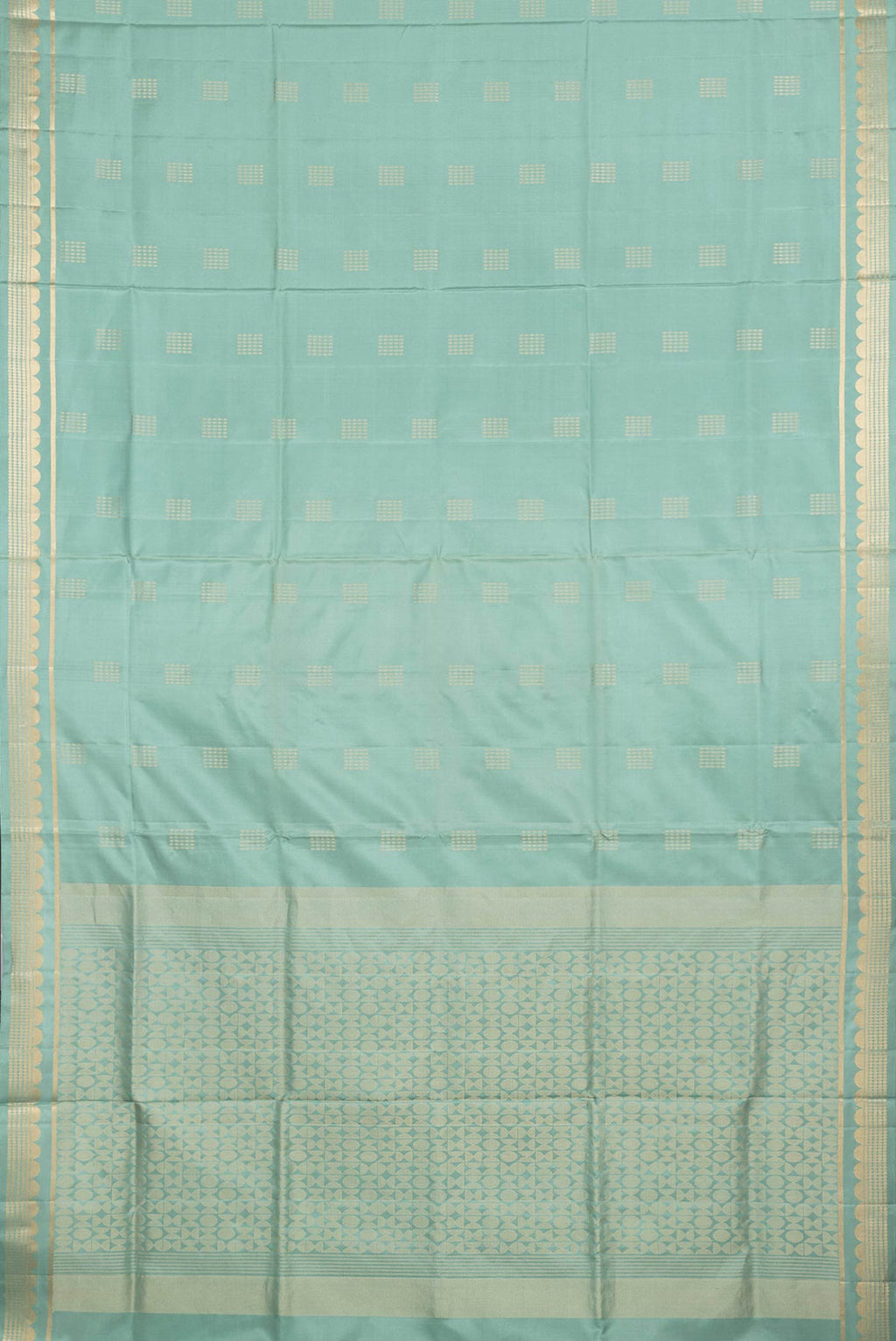 Flat view of Sea Green Dual Tone Soft Silk Saree with Zari Butta on the body and Zari Border. 