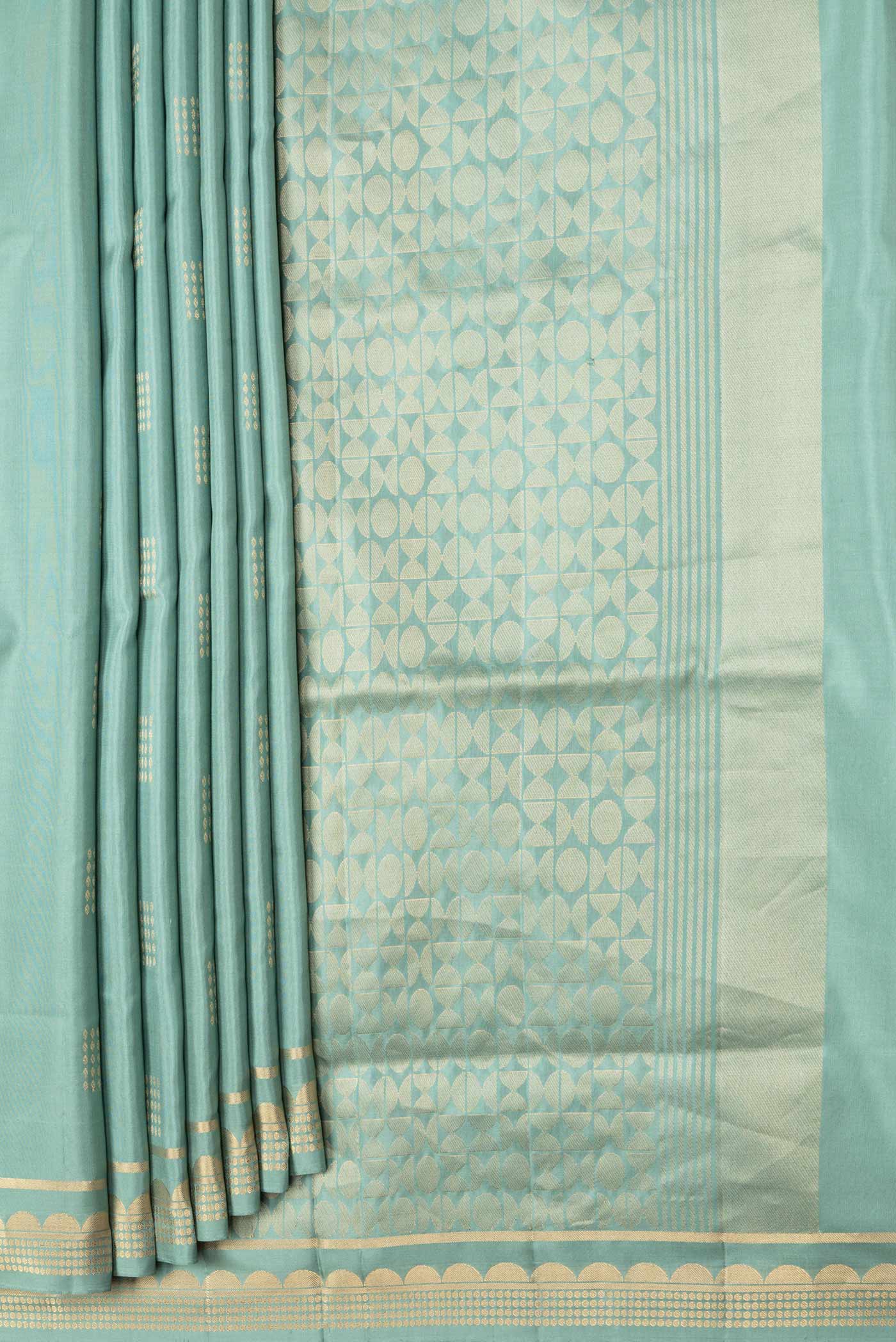 Pleats and pallu of Sea Green Dual Tone Soft Silk Saree with Zari Butta on the body and Zari Border. 