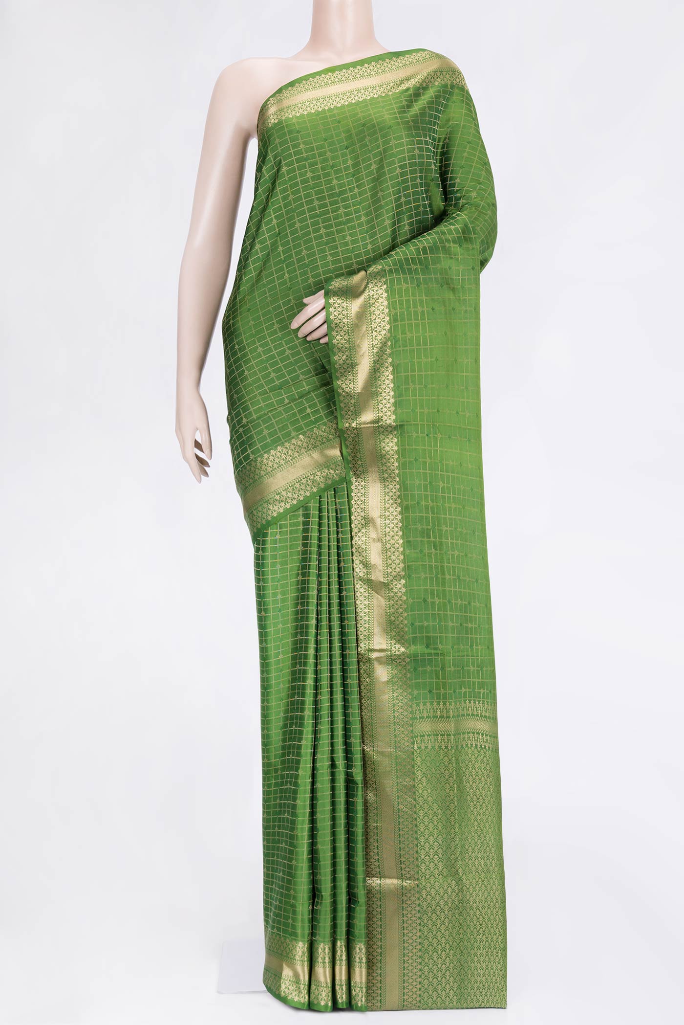 Green Dual Tone Soft Silk Saree with Checked design on the body and Thread Border.  displayed on a mannequin