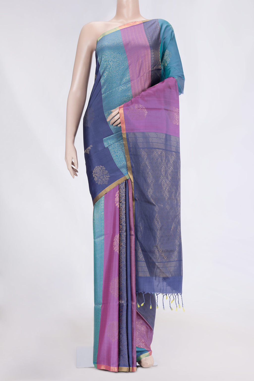 Lavender Dual Tone Soft Silk Saree with Zari Butta on the body and Thin Zari Line.  displayed on a mannequin