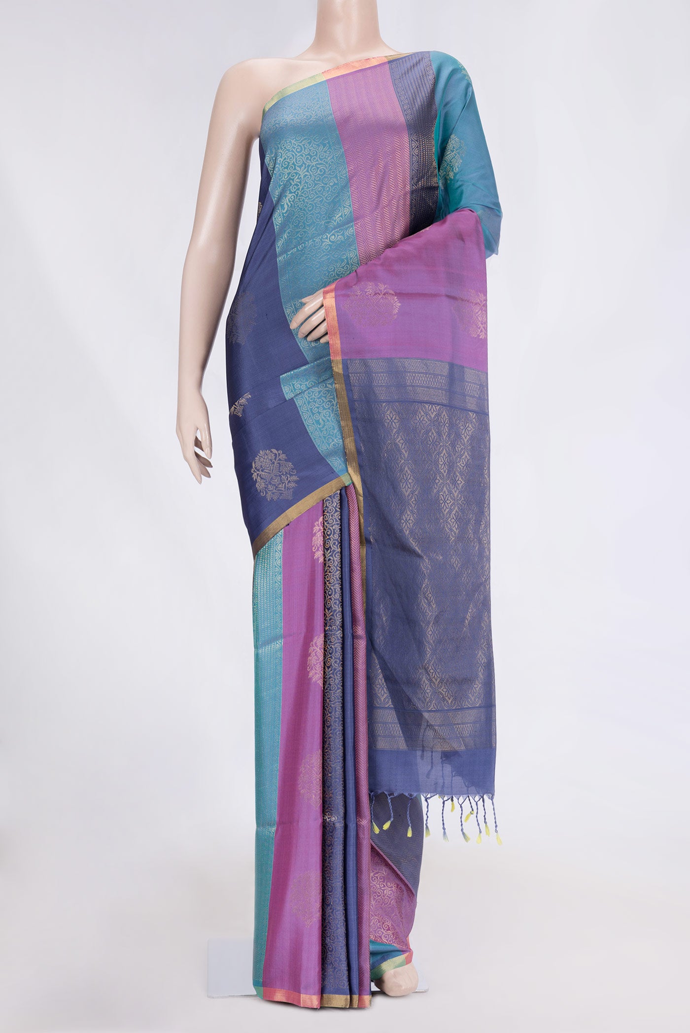 Lavender Dual Tone Soft Silk Saree with Zari Butta on the body and Thin Zari Line.  displayed on a mannequin
