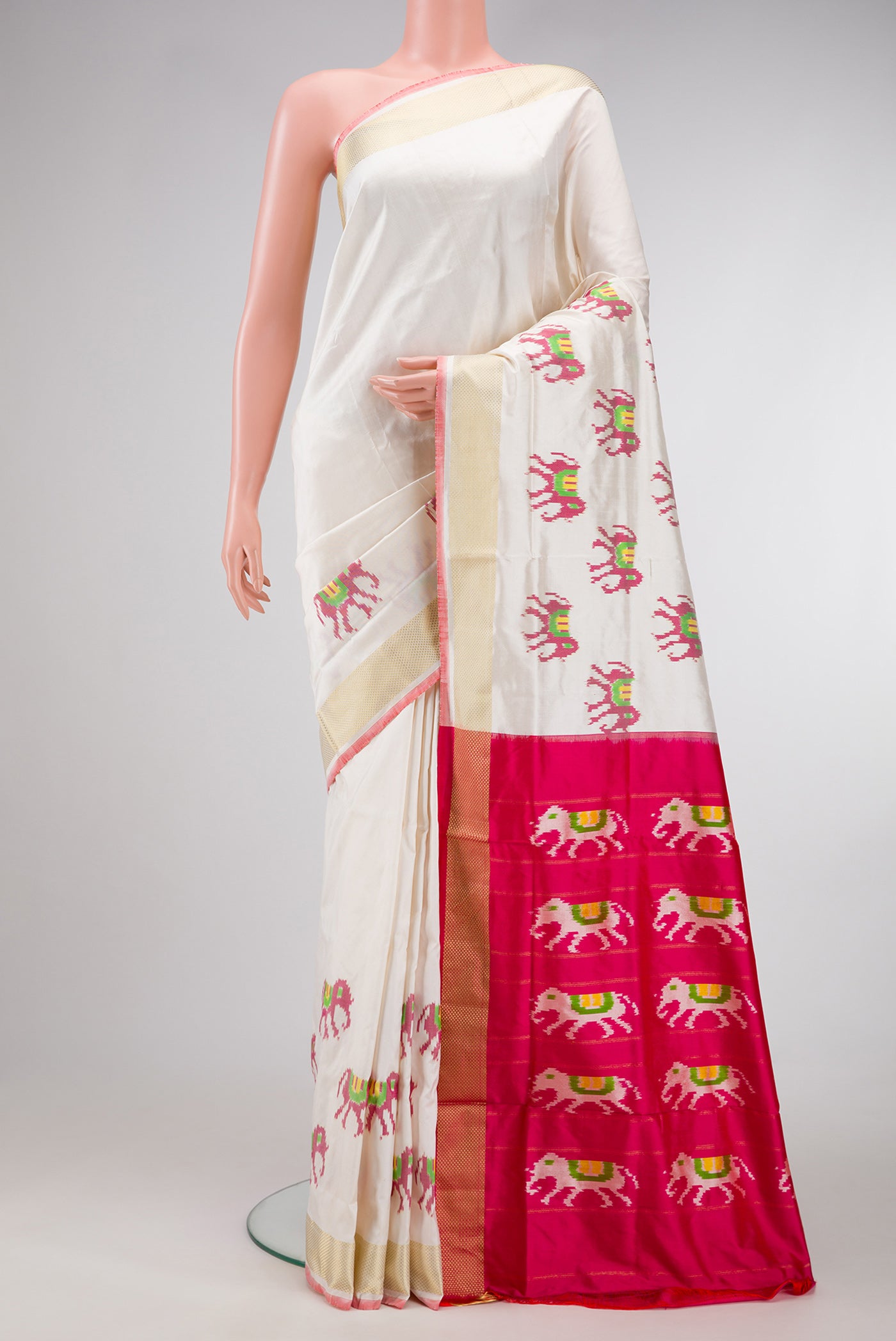 Off White Dual Tone Double Ikat Saree with Plain Body and Ikat Border.  displayed on a mannequin