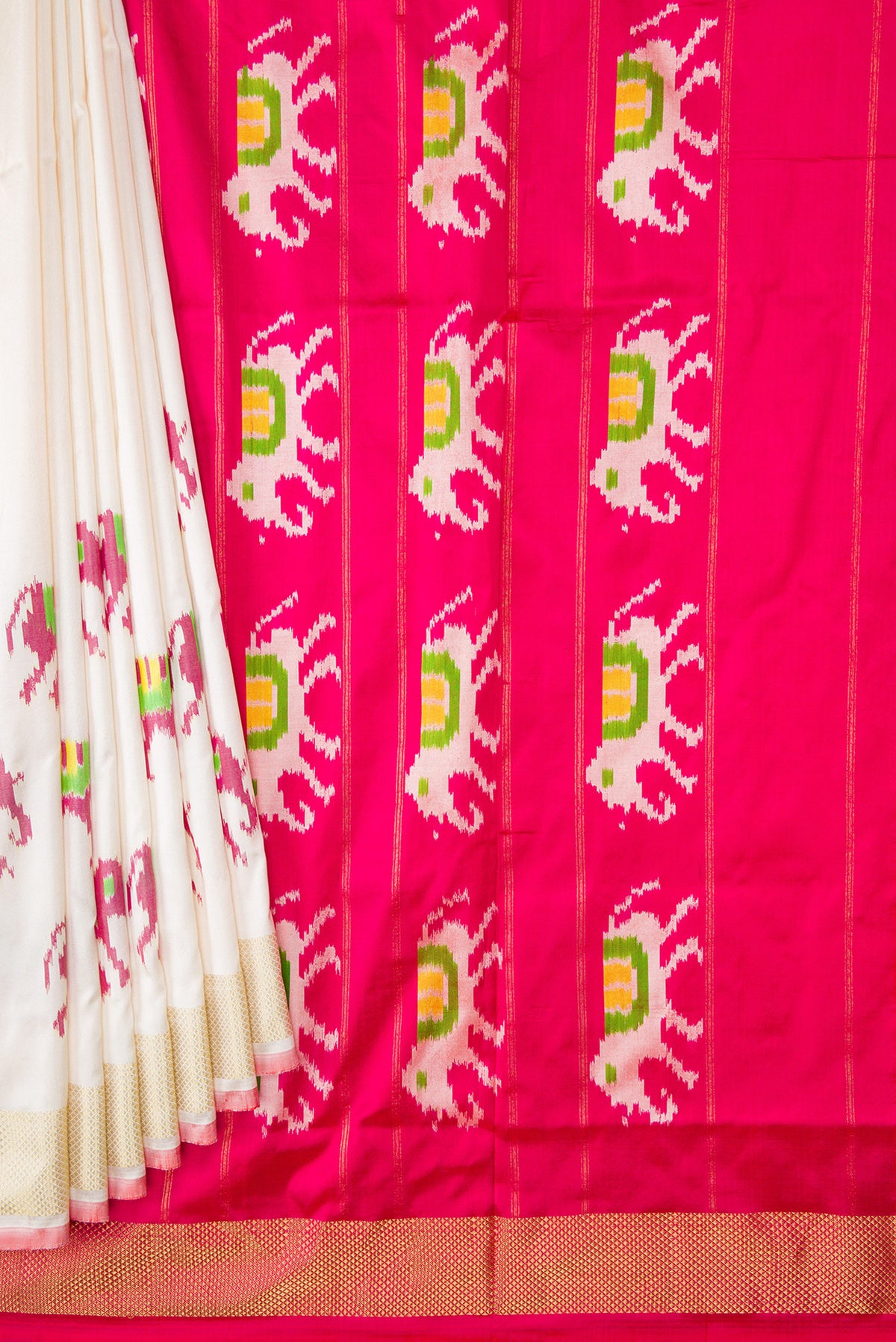 Pleats and pallu of Off White Dual Tone Double Ikat Saree with Plain Body and Ikat Border. 