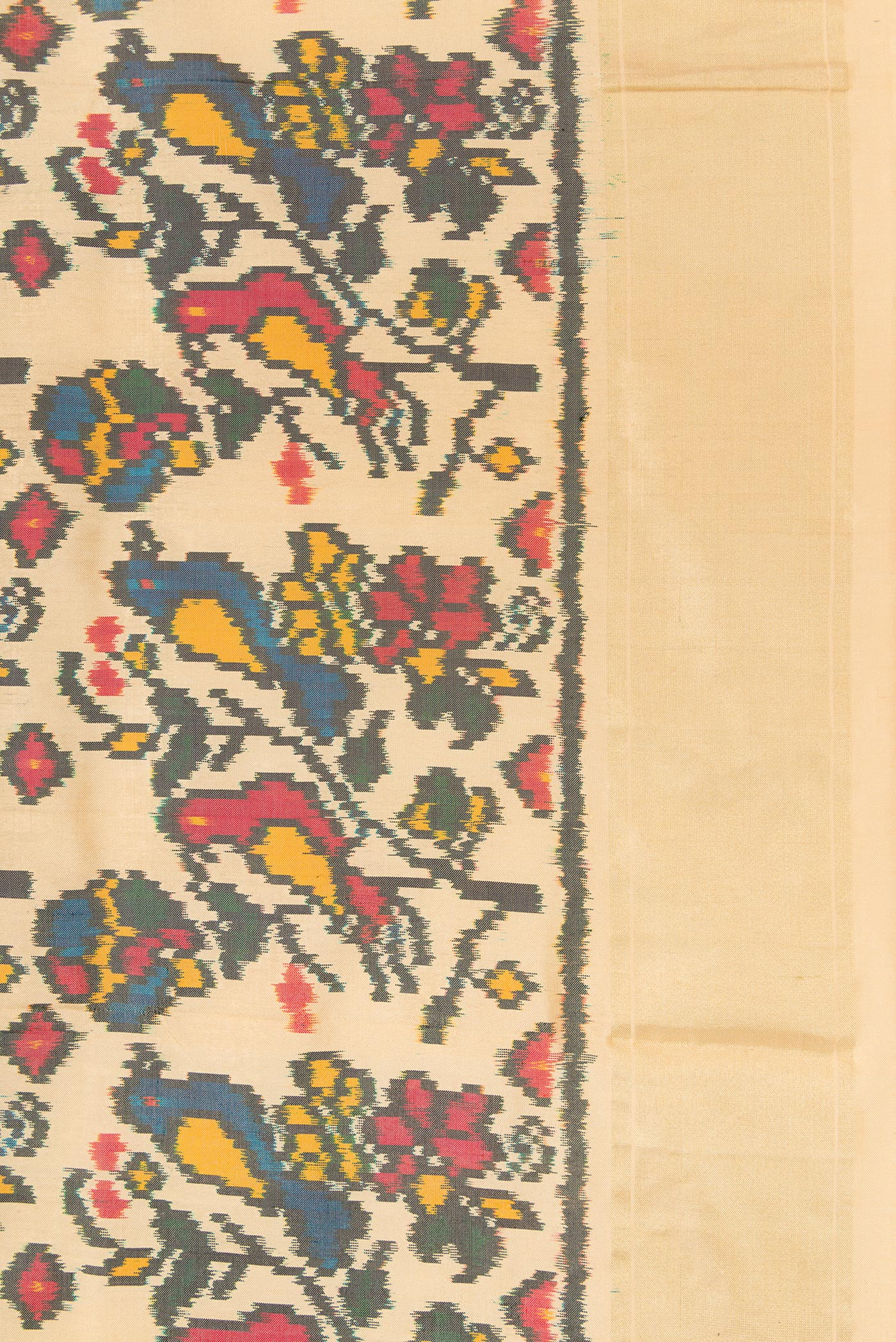 Border image of Sandal Dual Tone Double Ikat Saree with Ikat Print on the body and Zari Border. 