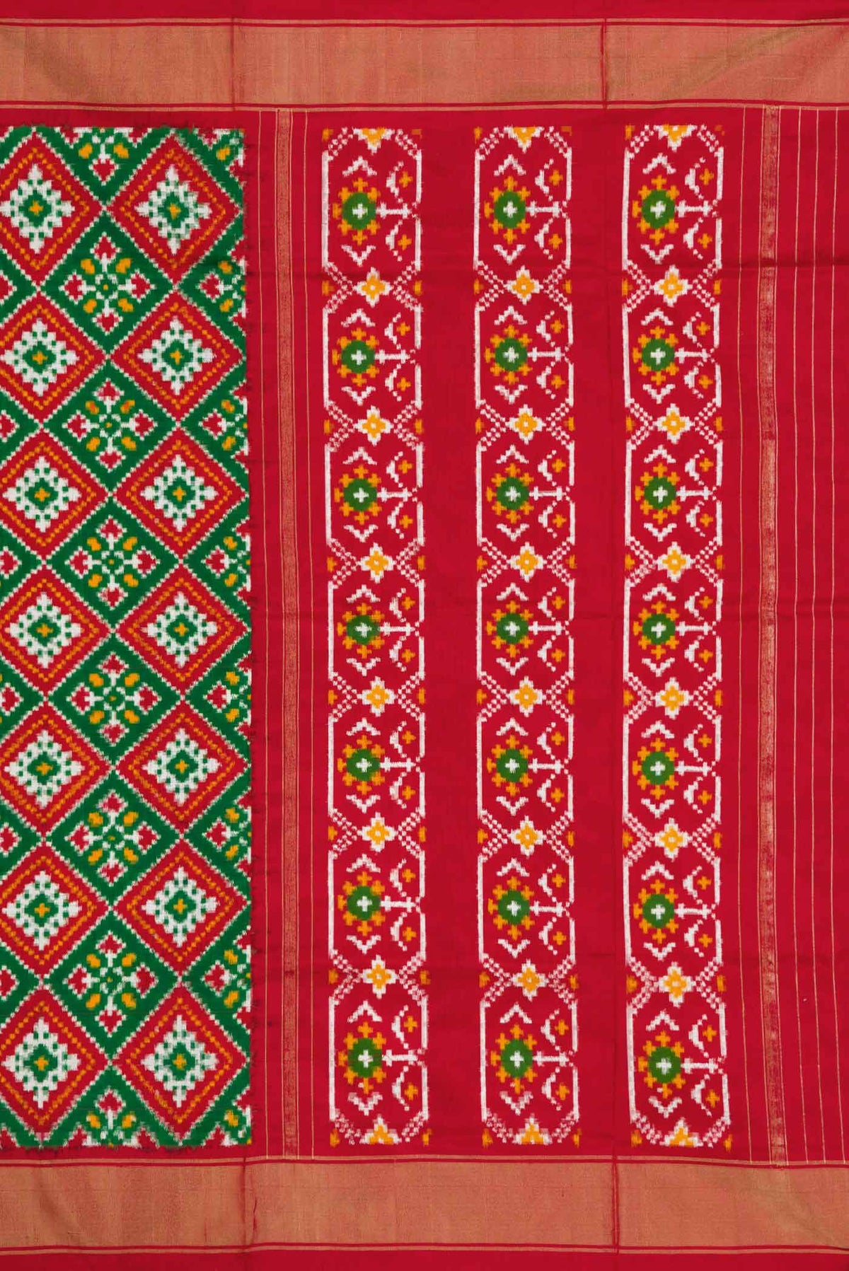 Close up image of the pallu of Green Pochampally Silk Saree with Pure Ikat on the body and Zari Border