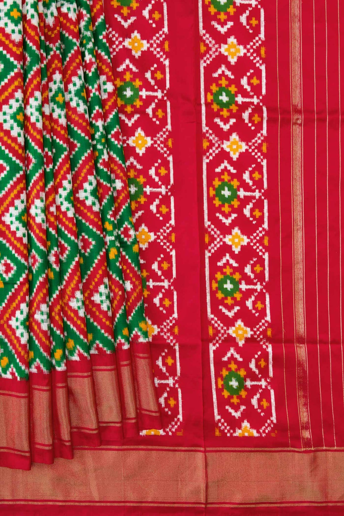 Pleats and pallu of Green Pochampally Silk Saree with Pure Ikat on the body and Zari Border