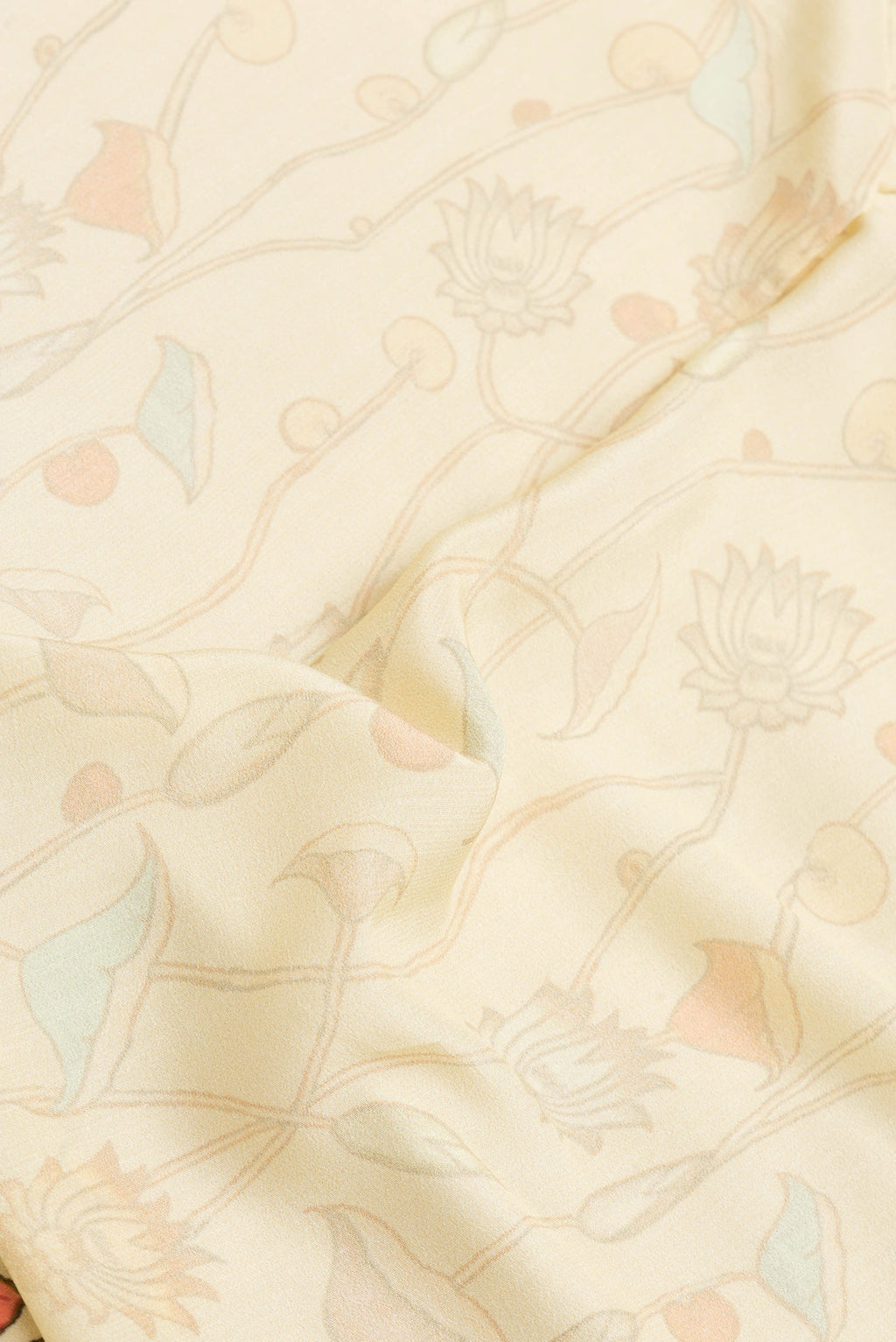 Close up of Sandal Dual Tone Mysore Crepe Saree with Printed design on the body and Plain Border.  displaying folds