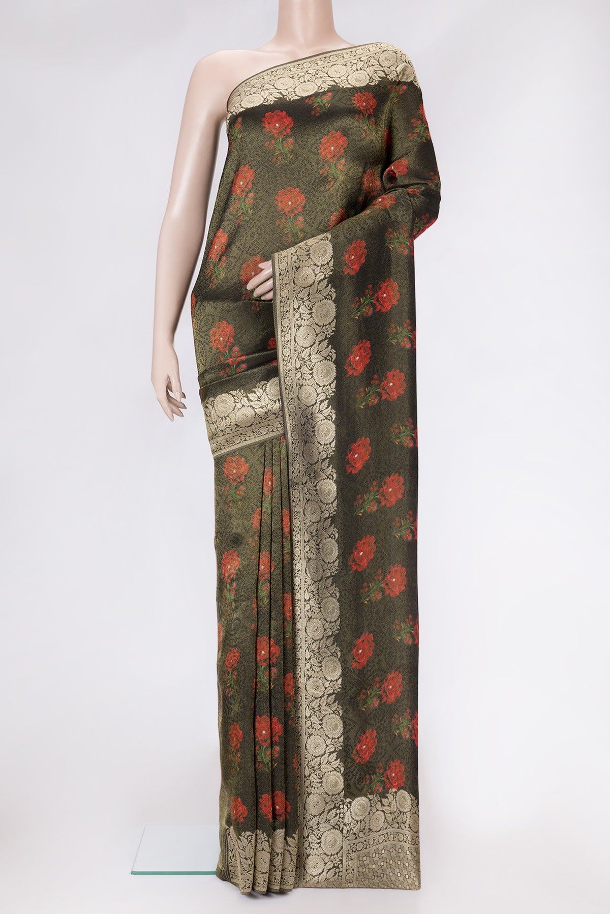 Black Dual Tone Organza Silk Saree with Printed design on the body and Zari Border.  displayed on a mannequin