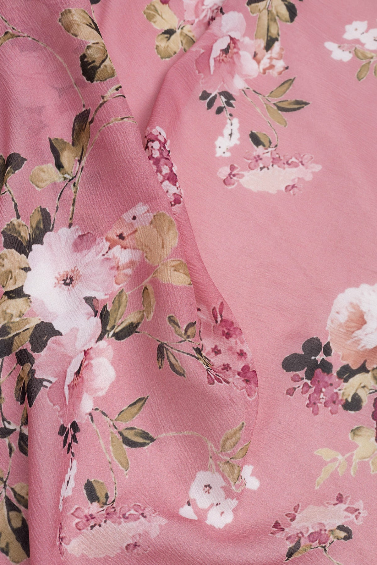 Close up of Pink Dual Tone Mysore Chiffon Saree with Printed design on the body and Without Border.  displaying folds
