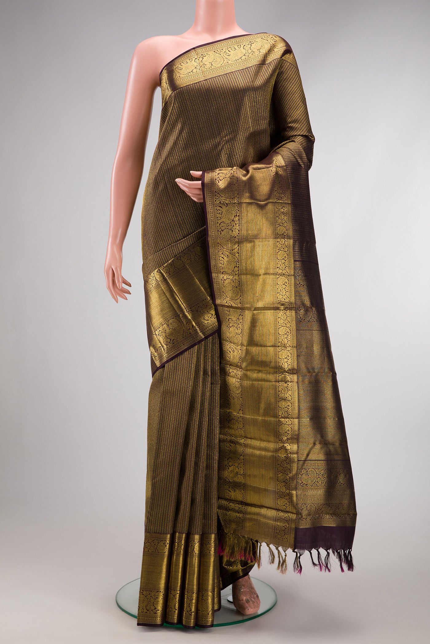 Coffee Brown Dual Tone Kanchipuram Silk Saree with Zari Brocade on the body and Zari Border.  displayed on a mannequin