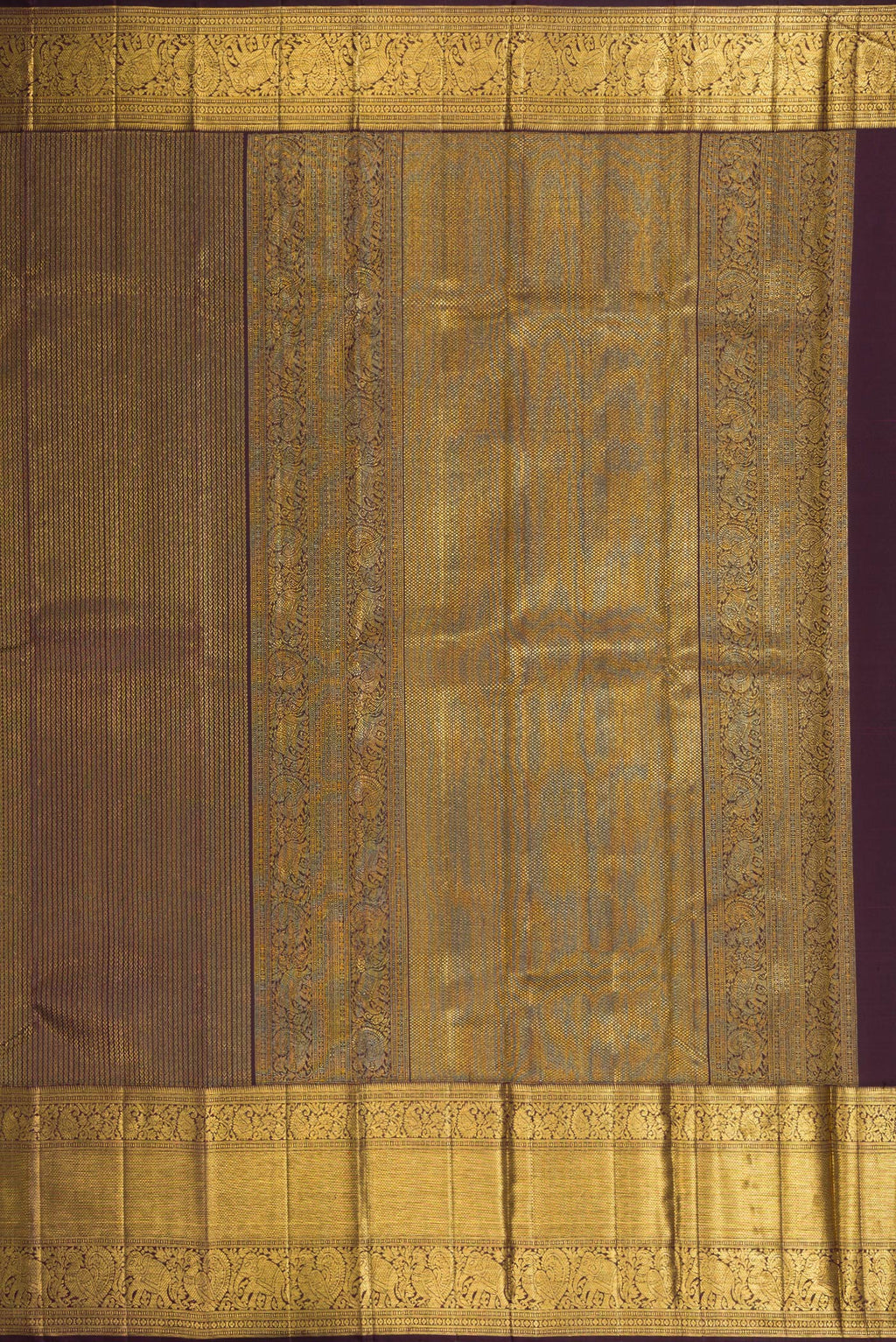 Close up image of the pallu of Coffee Brown Dual Tone Kanchipuram Silk Saree with Zari Brocade on the body and Zari Border. 