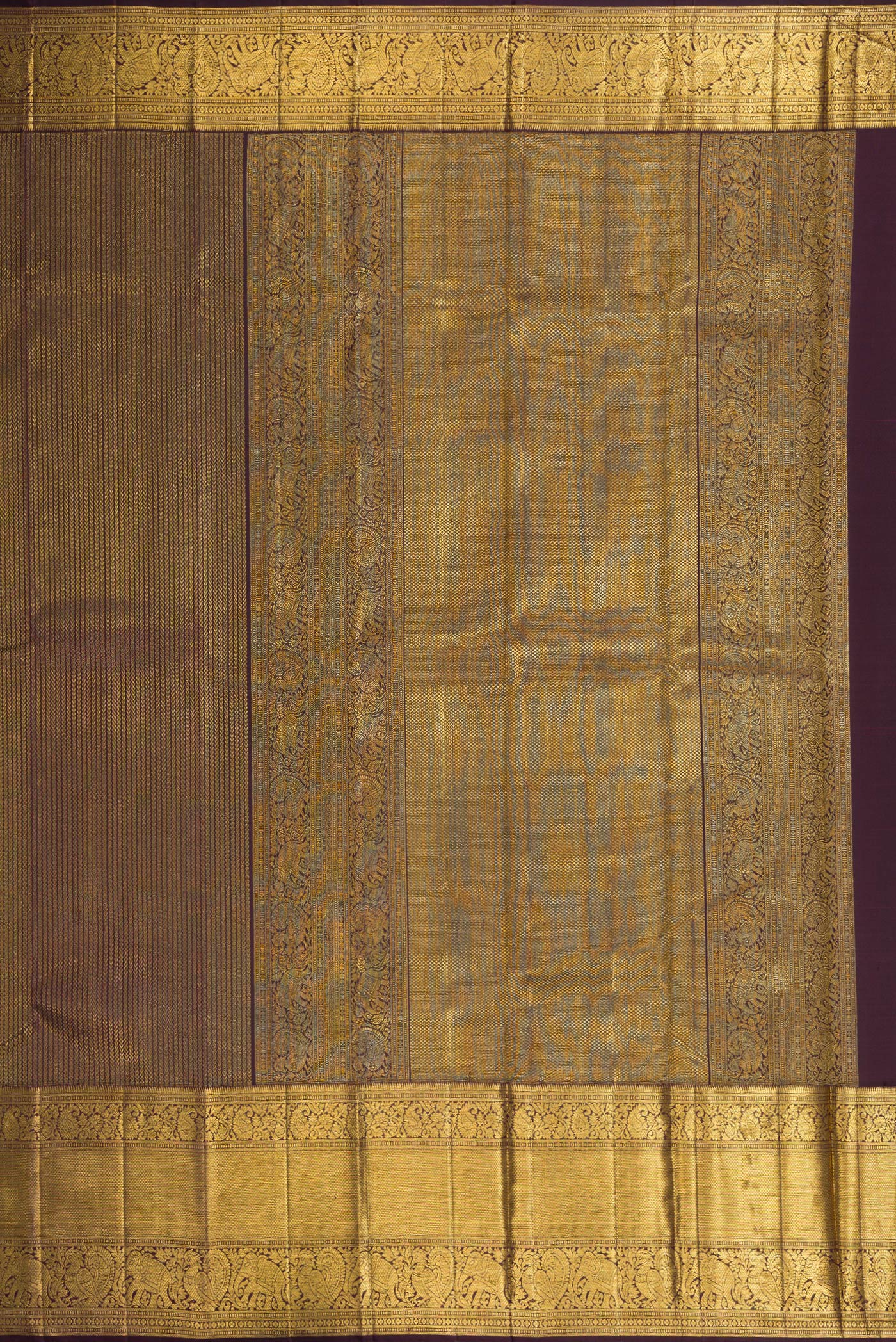 Close up image of the pallu of Coffee Brown Dual Tone Kanchipuram Silk Saree with Zari Brocade on the body and Zari Border. 