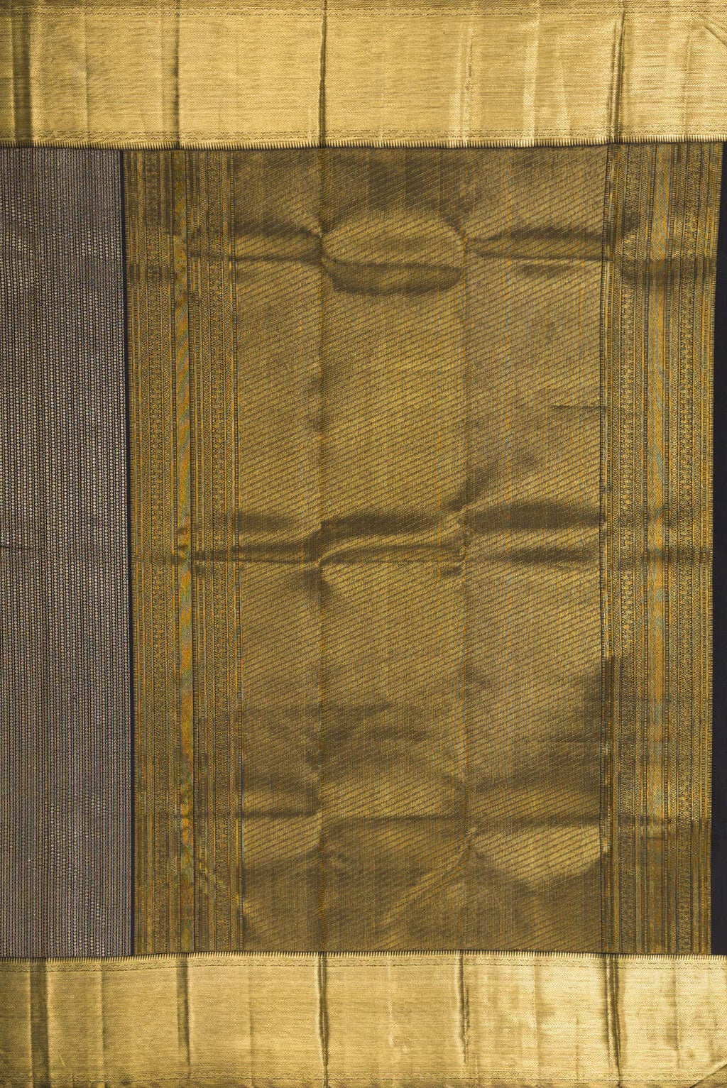 Close up image of the pallu of Black Kanchipuram Silk Saree with Zari Brocade on the body and Zari Border. 