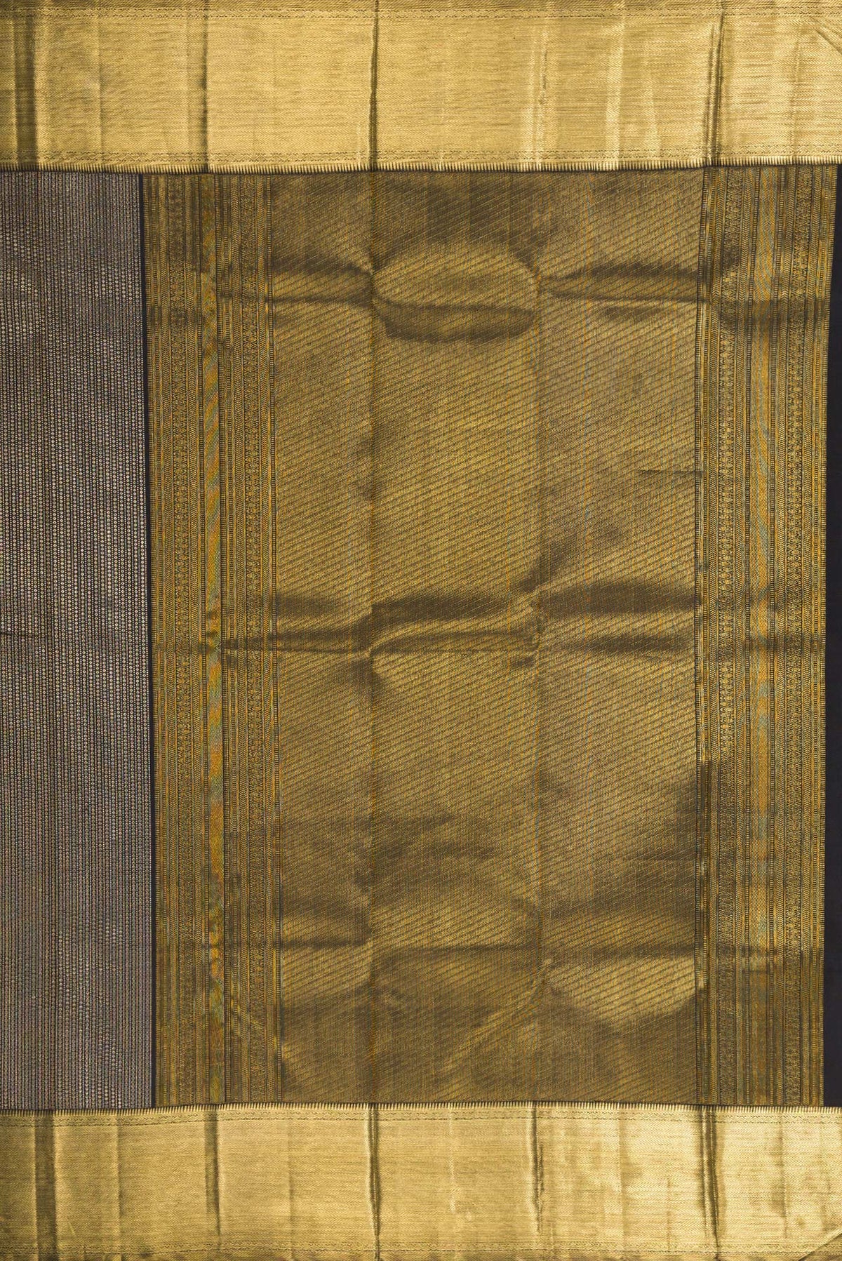 Close up image of the pallu of Black Kanchipuram Silk Saree with Zari Brocade on the body and Zari Border. 