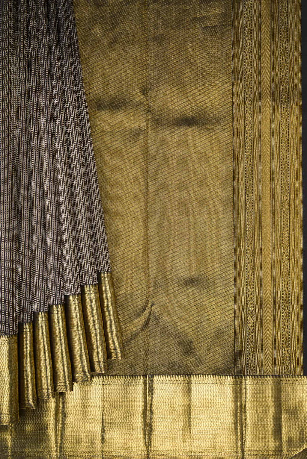 Pleats and pallu of Black Kanchipuram Silk Saree with Zari Brocade on the body and Zari Border. 