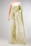 Pista Green Dual Tone Kanchipuram Silk Saree with Zari Brocade on the body and Zari Border.  displayed on a mannequin