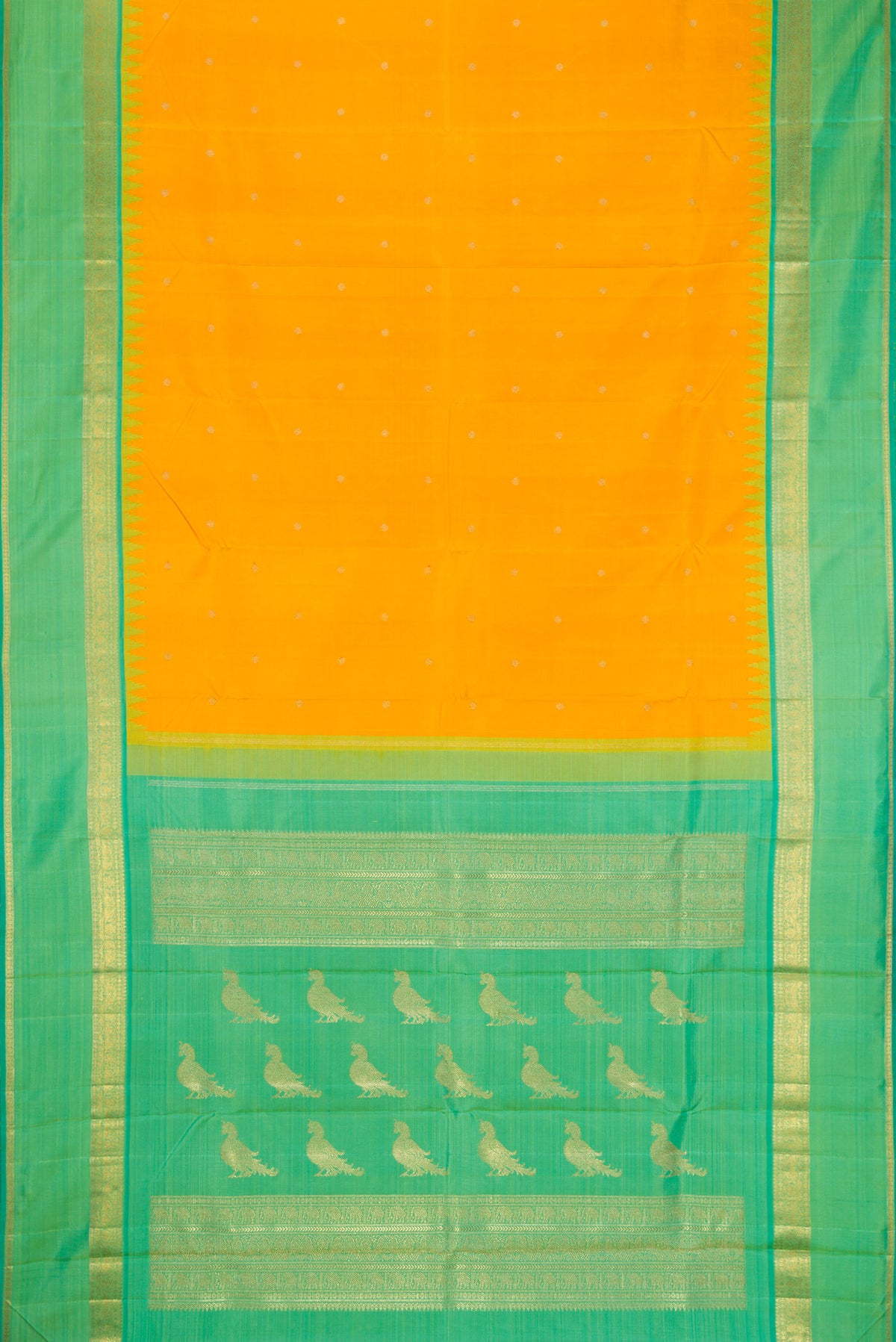 Flat view of Yellow Kanchipuram Silk Saree with Zari Butta on the body and Zari Border. 