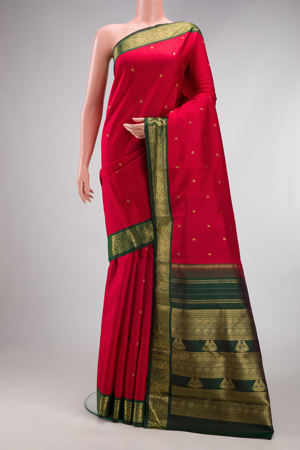 Pure Silk Pure Zari Red Kanchipuram Saree with Zari Butta on the body and Zari Border.  displayed on a mannequin