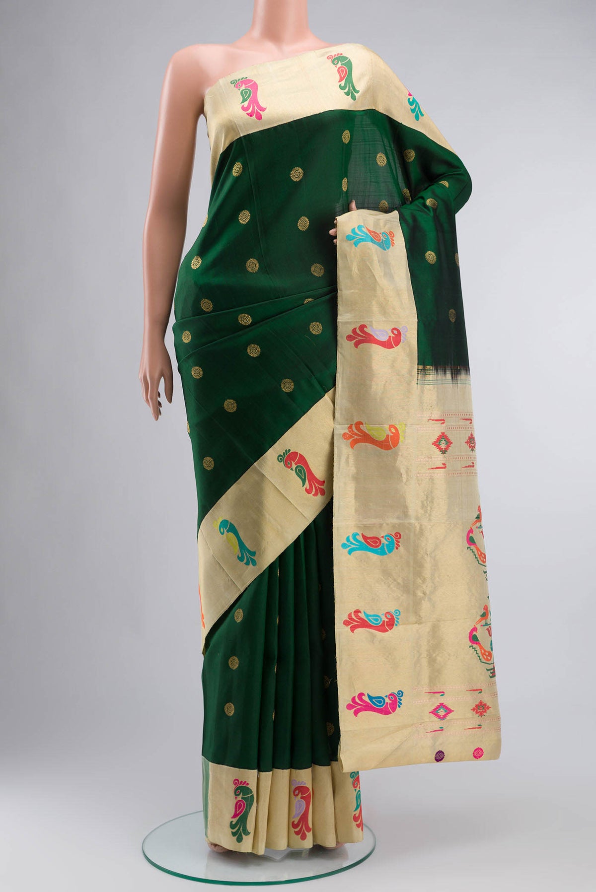 Green Paithani Silk Saree with Zari Butta on the body and Zari Border displayed on a mannequin