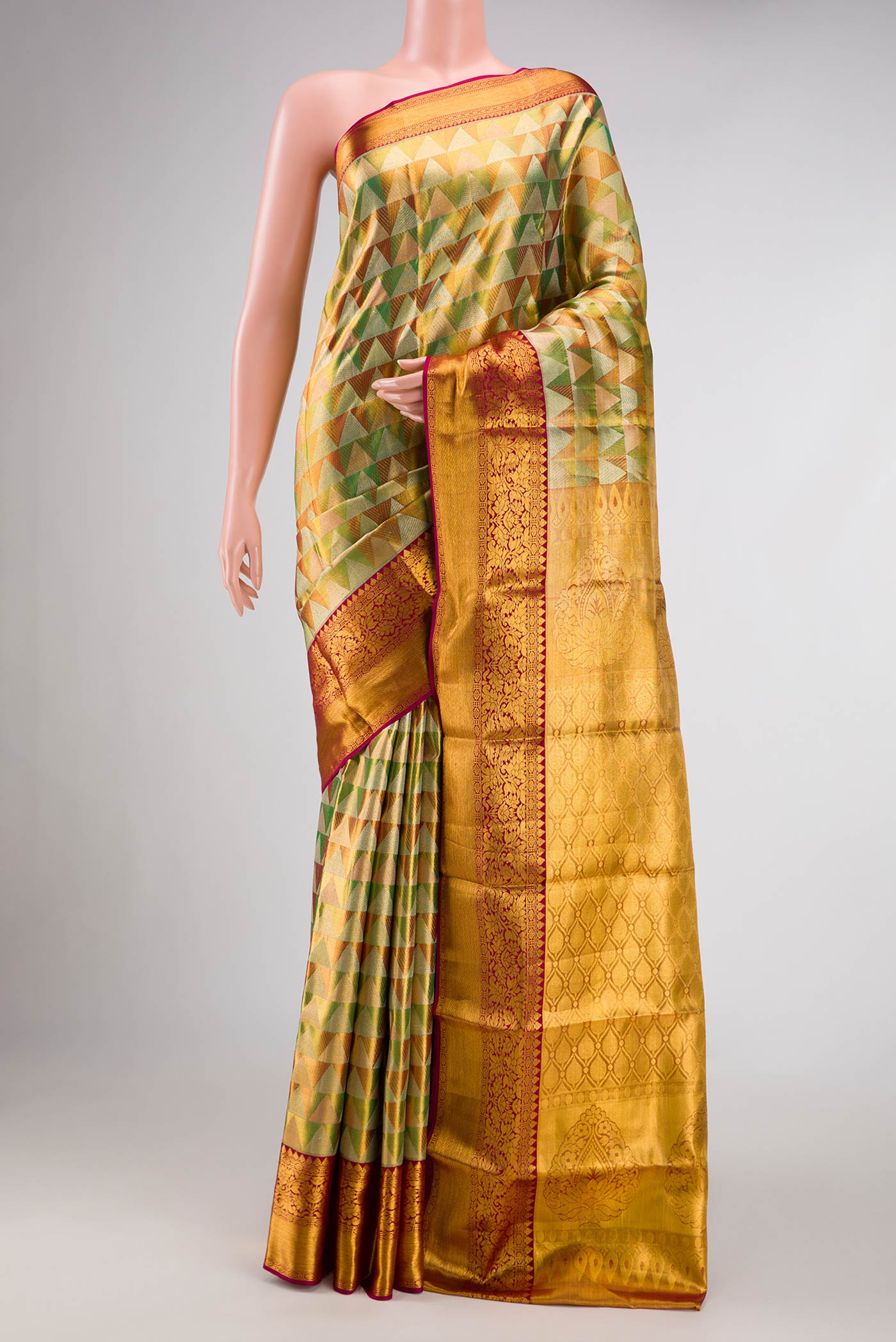 Green Dual Tone Kanchipuram Tissue Silk Saree with Zari Brocade on the body and Zari Border.  displayed on a mannequin