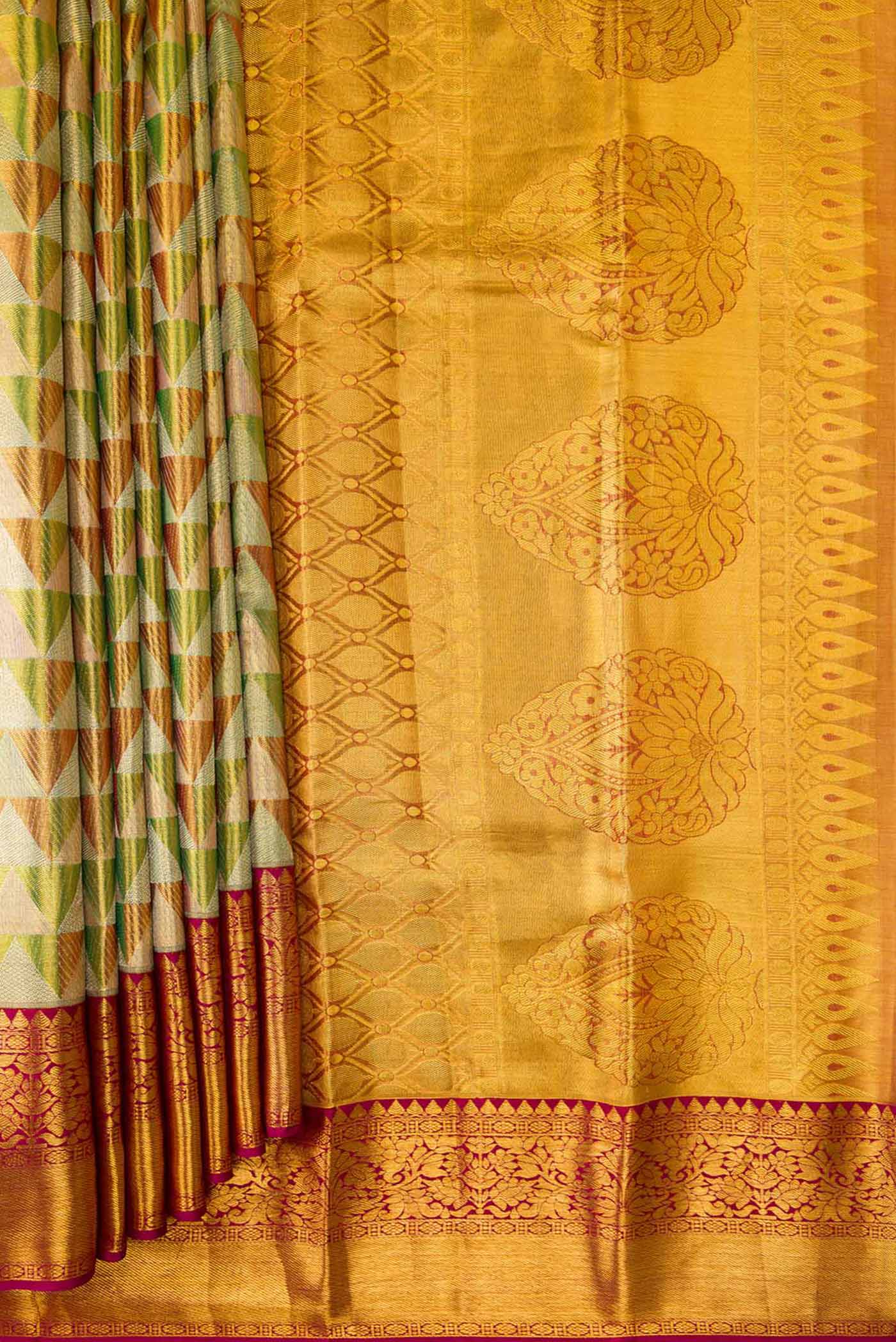 Pleats and pallu of Green Dual Tone Kanchipuram Tissue Silk Saree with Zari Brocade on the body and Zari Border. 