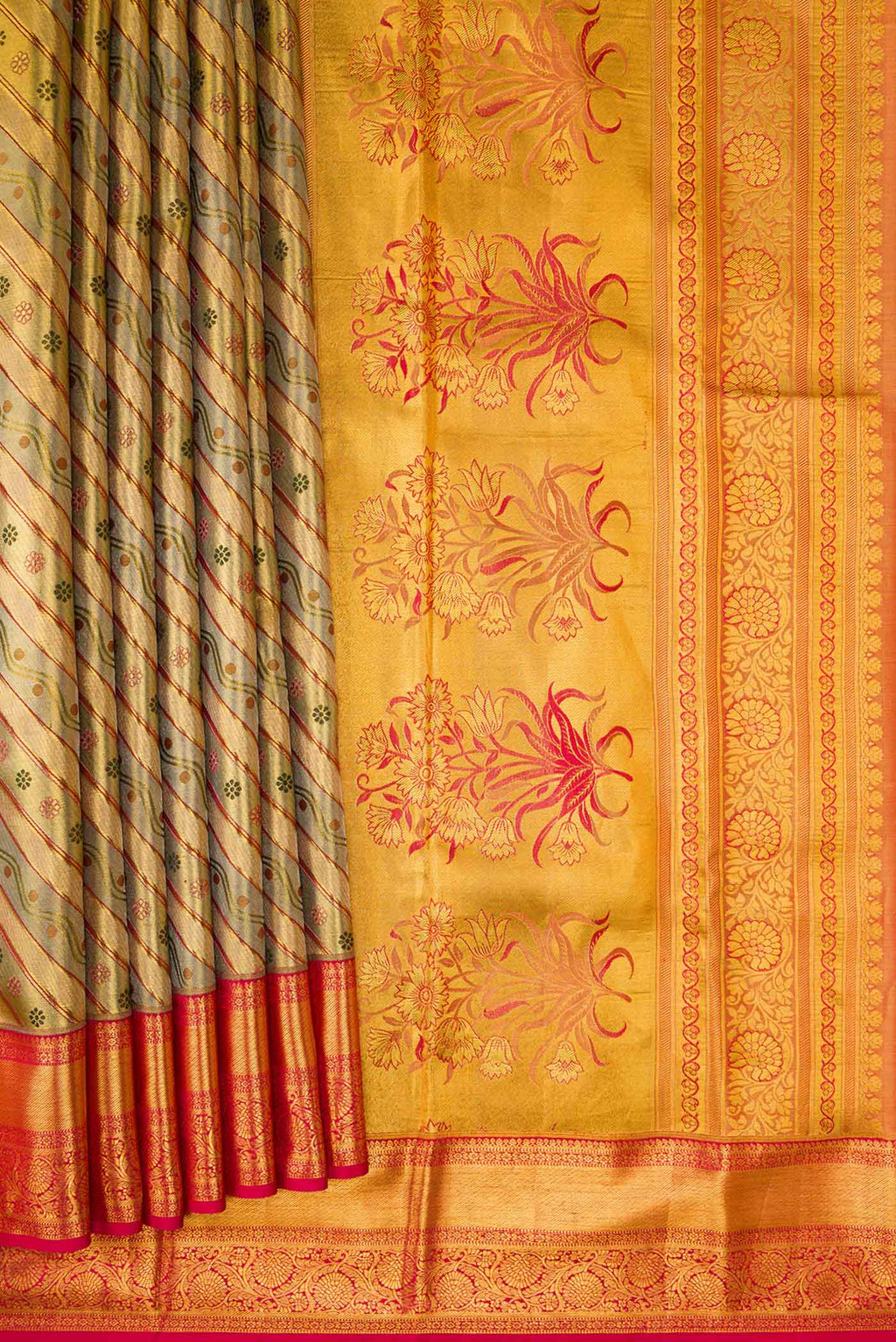 Pleats and pallu of Gold Dual Tone Kanchipuram Tissue Silk Saree with Zari Brocade on the body and Zari Border. 