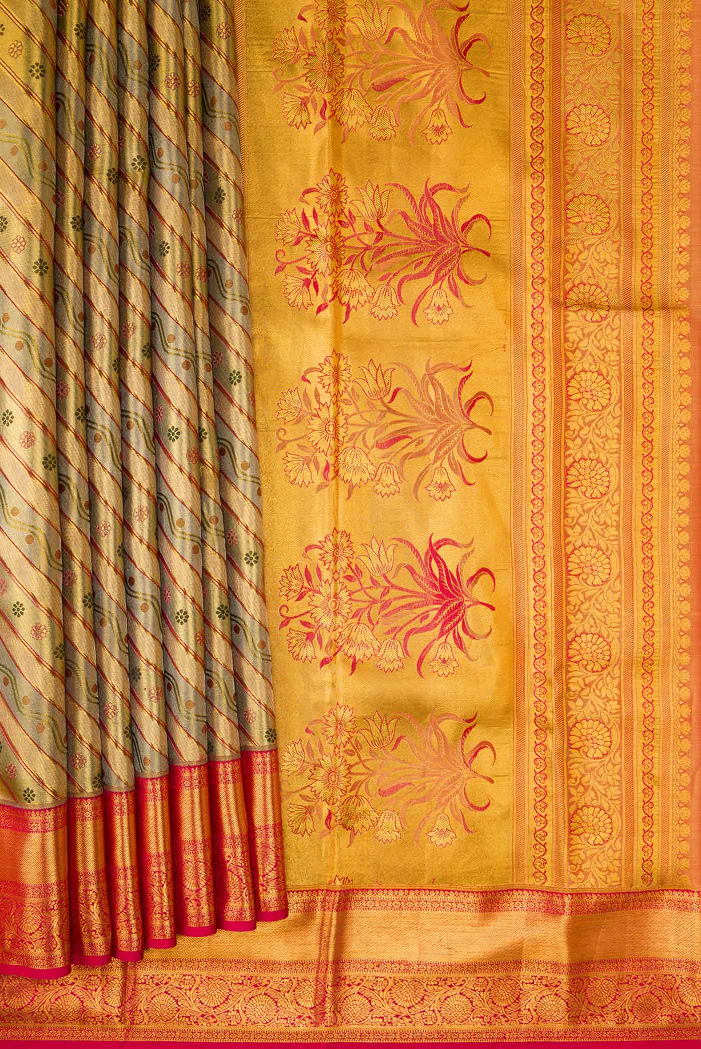 Pleats and pallu of Gold Dual Tone Kanchipuram Tissue Silk Saree with Zari Brocade on the body and Zari Border. 