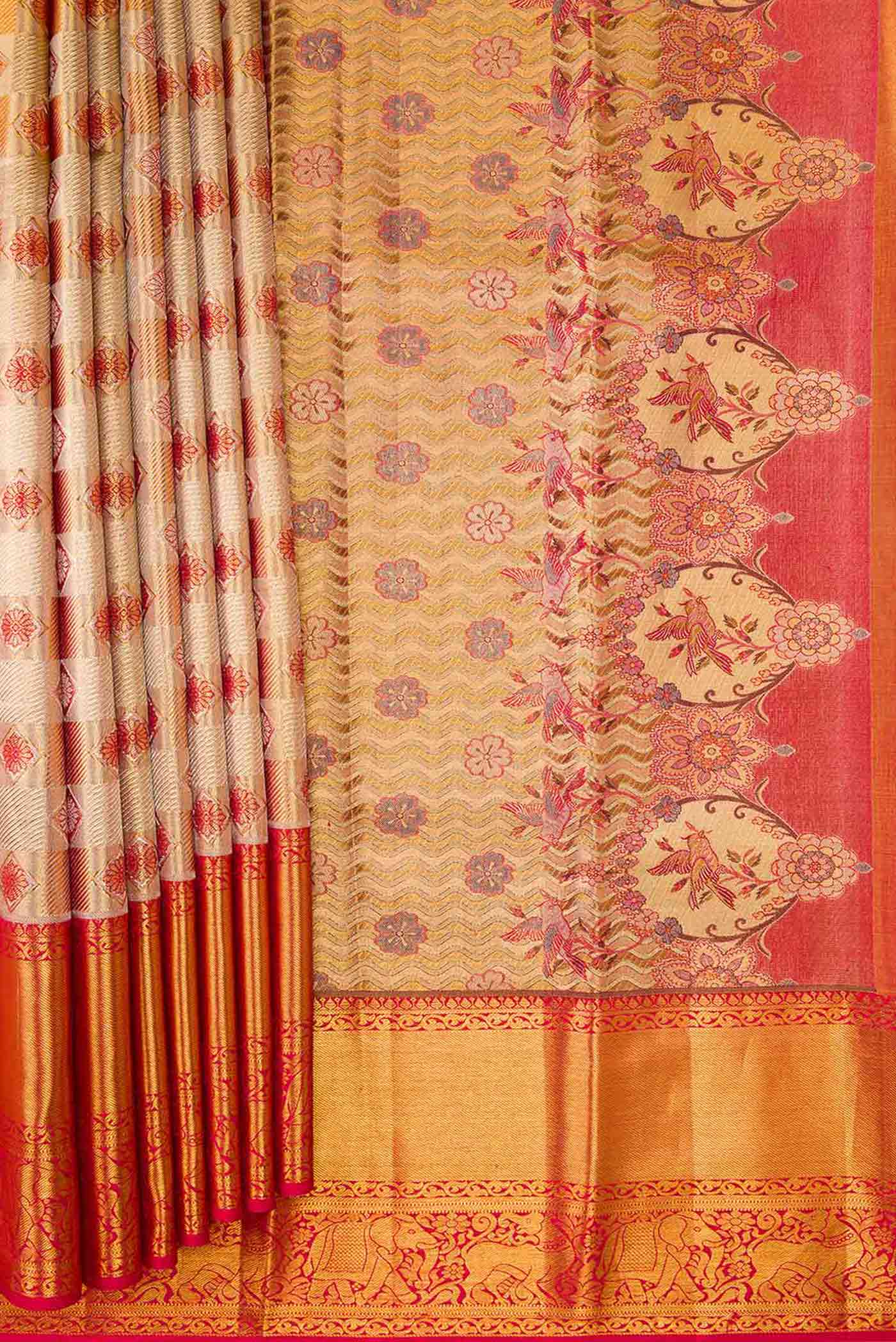 Pleats and pallu of Gold Dual Tone Kanchipuram Tissue Silk Saree with Zari Brocade on the body and Zari Border. 