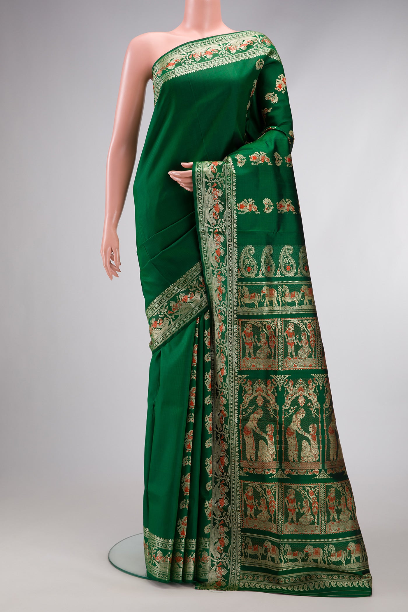 Bottle Green Dual Tone Baluchari Silk Saree with Thread Butta on the body and Thread Border.  displayed on a mannequin