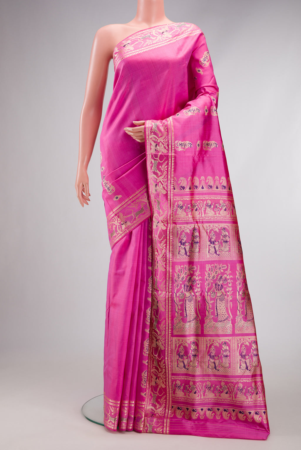 Pink Baluchari Silk Saree with Thread Butta on the body and Fancy Border.  displayed on a mannequin