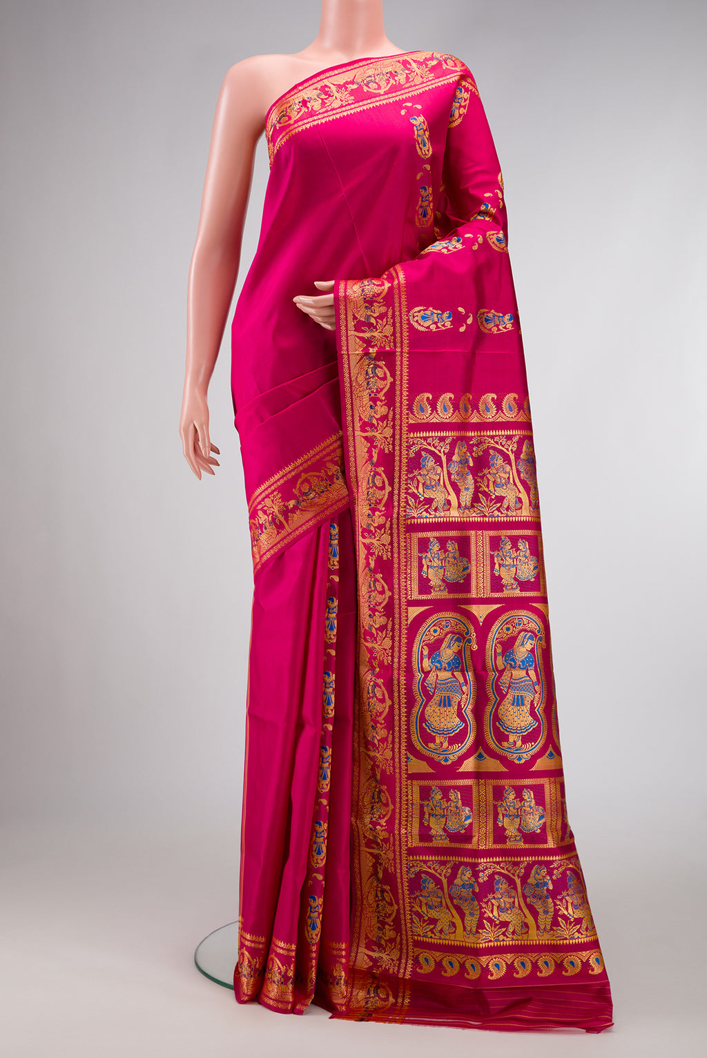 Pink Dual Tone Baluchari Silk Saree with Thread Butta on the body and Thread Border.  displayed on a mannequin