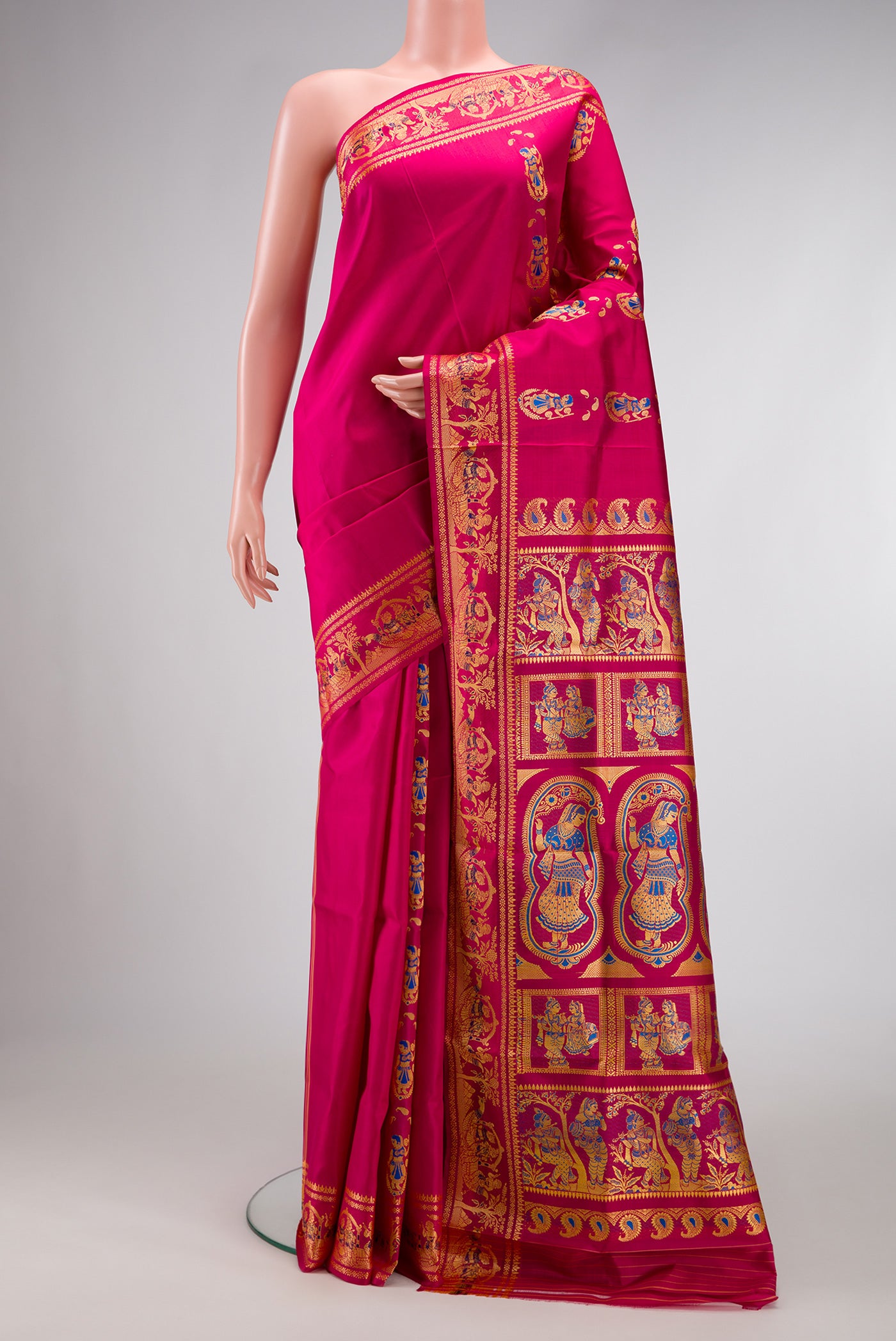 Pink Dual Tone Baluchari Silk Saree with Thread Butta on the body and Thread Border.  displayed on a mannequin