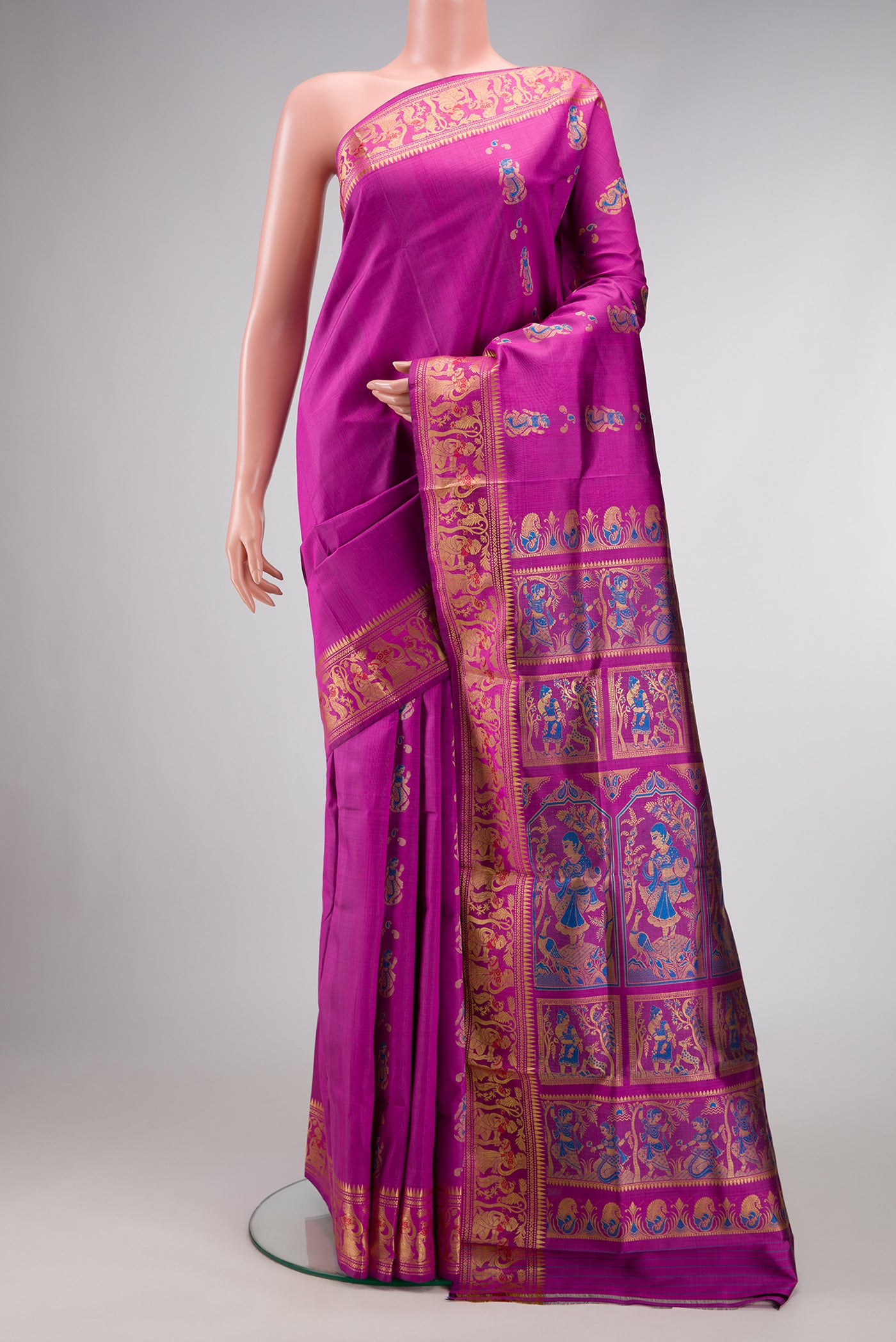 Purple Dual Tone Baluchari Silk Saree with Thread Butta on the body and Fancy Border.  displayed on a mannequin