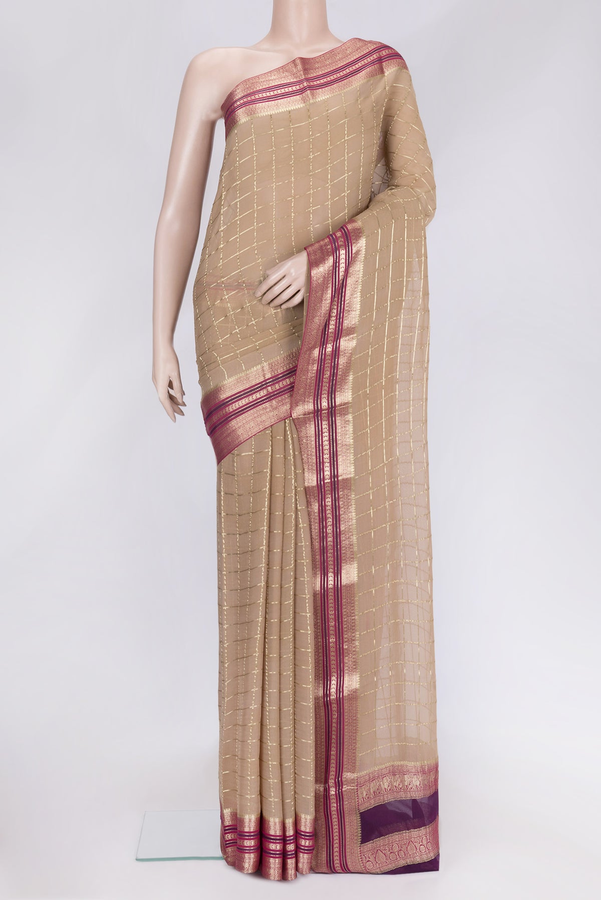 Brown Dual Tone Mysore Georgette Saree with Checked design on the body and Zari Border.  displayed on a mannequin