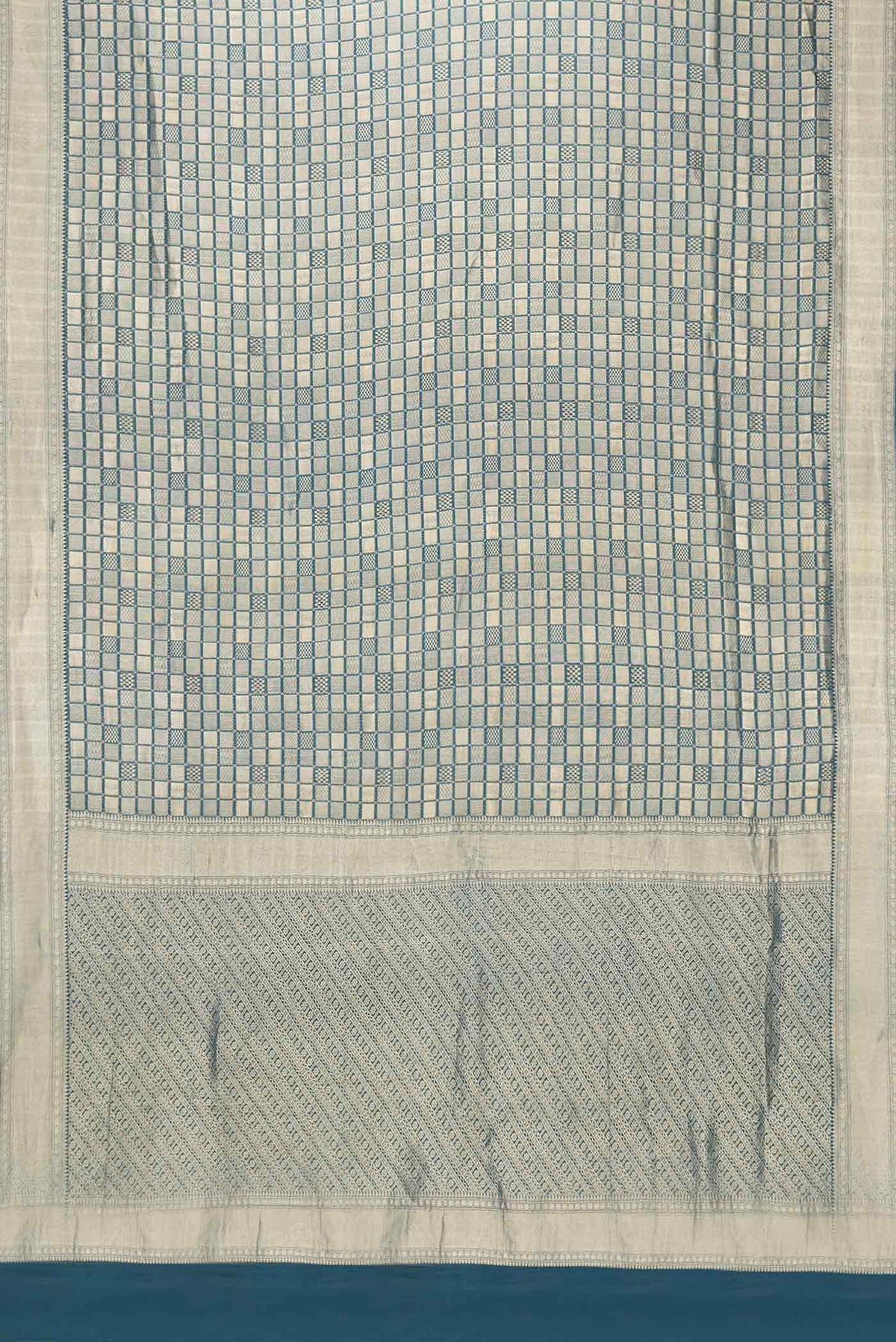 Flat view of Sky Blue Dual Tone Mysore Georgette Saree with Zari Brocade on the body and Zari Border