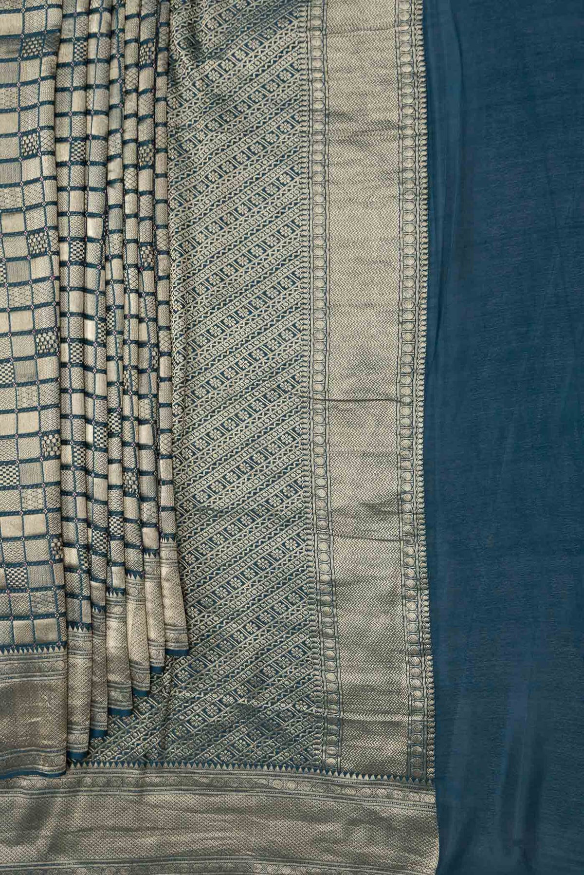 Pleats and pallu of Sky Blue Dual Tone Mysore Georgette Saree with Zari Brocade on the body and Zari Border