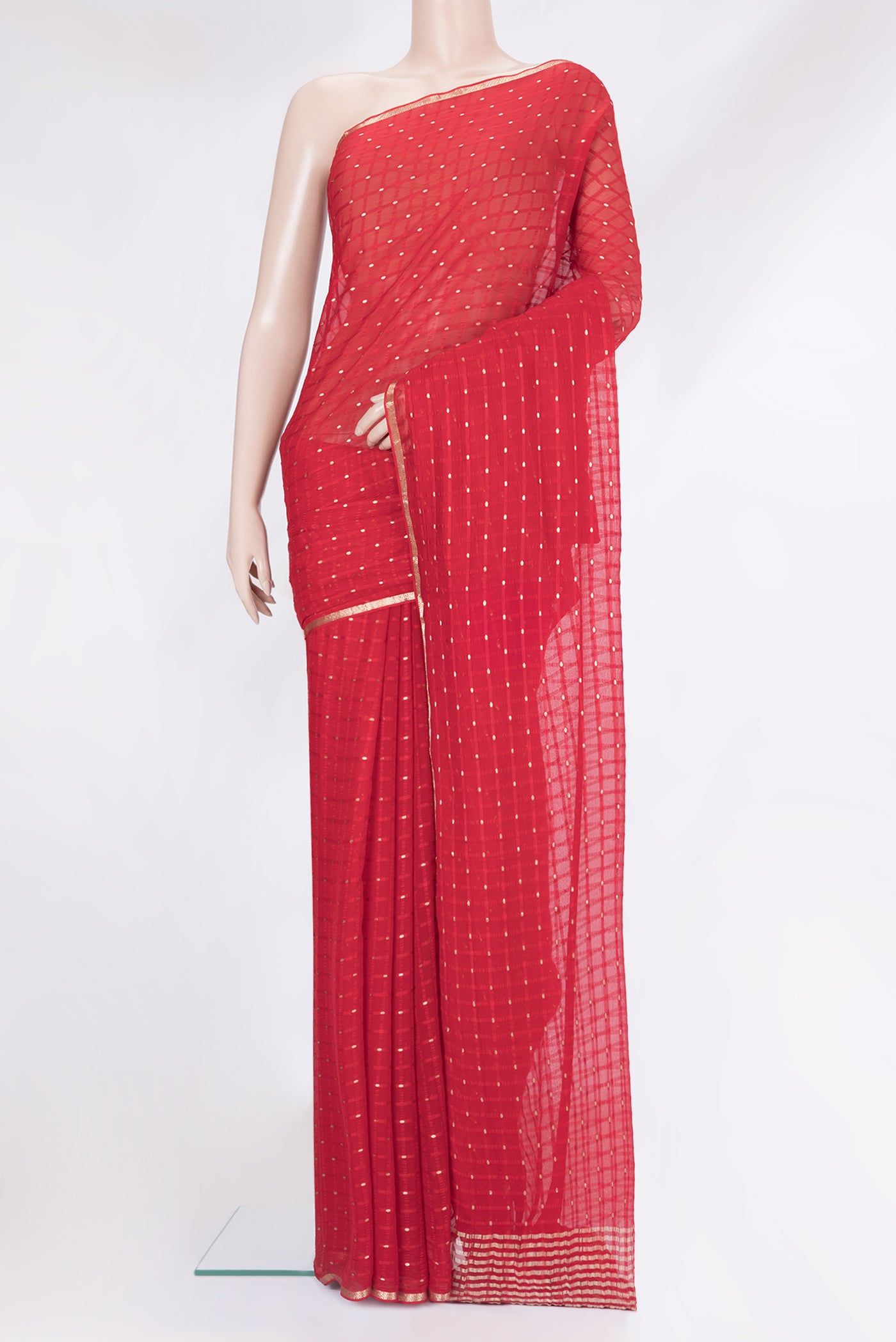 Red Mysore Chiffon Saree with Checked design on the body and Zari Border.  displayed on a mannequin