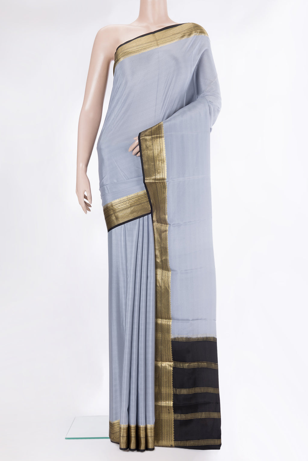 Grey Mysore Crepe Saree with Plain Body and Zari Border.  displayed on a mannequin
