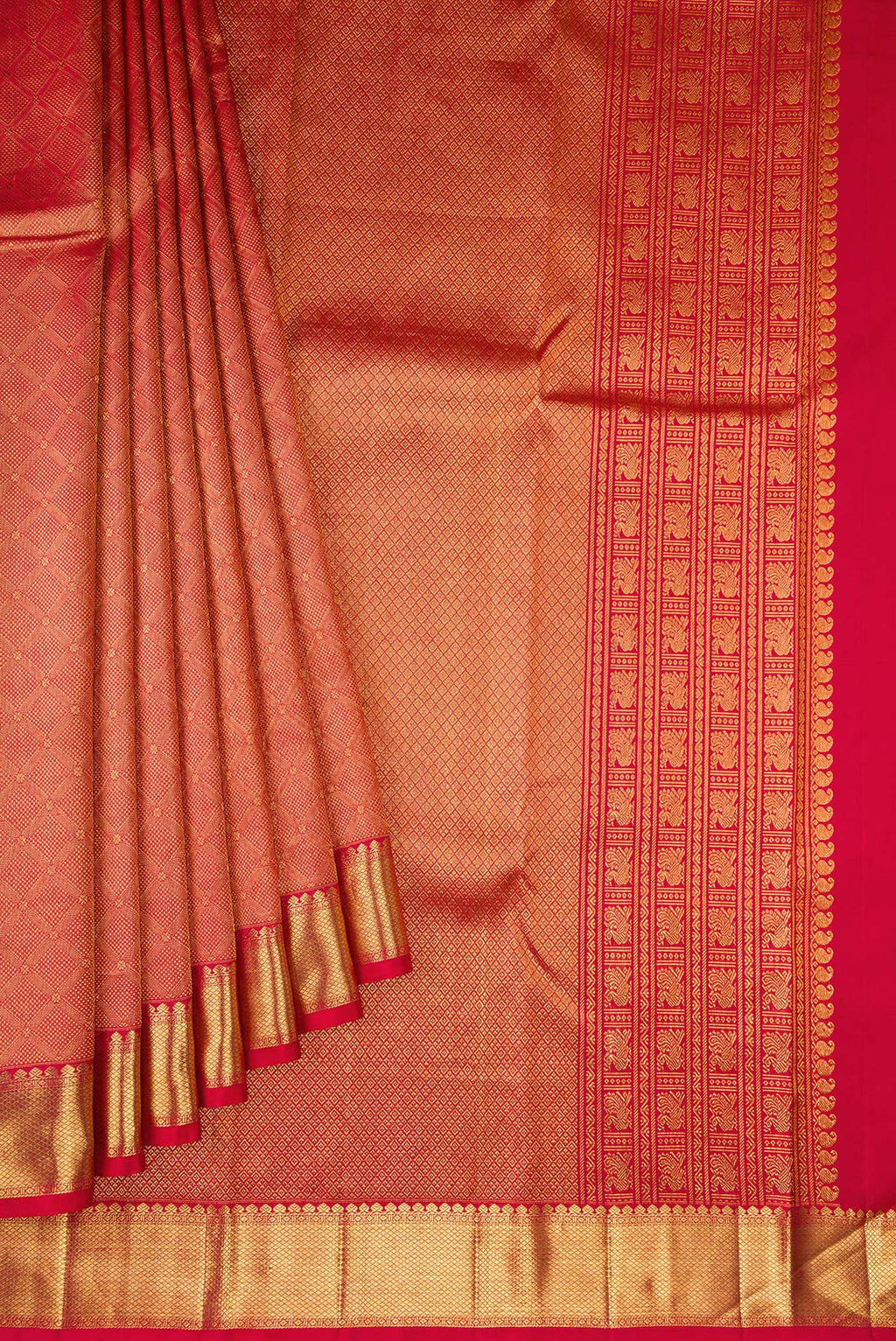 Pleats and pallu of Maroon Dual Tone Kanchipuram Silk Saree with Zari Brocade on the body and Zari Border. 