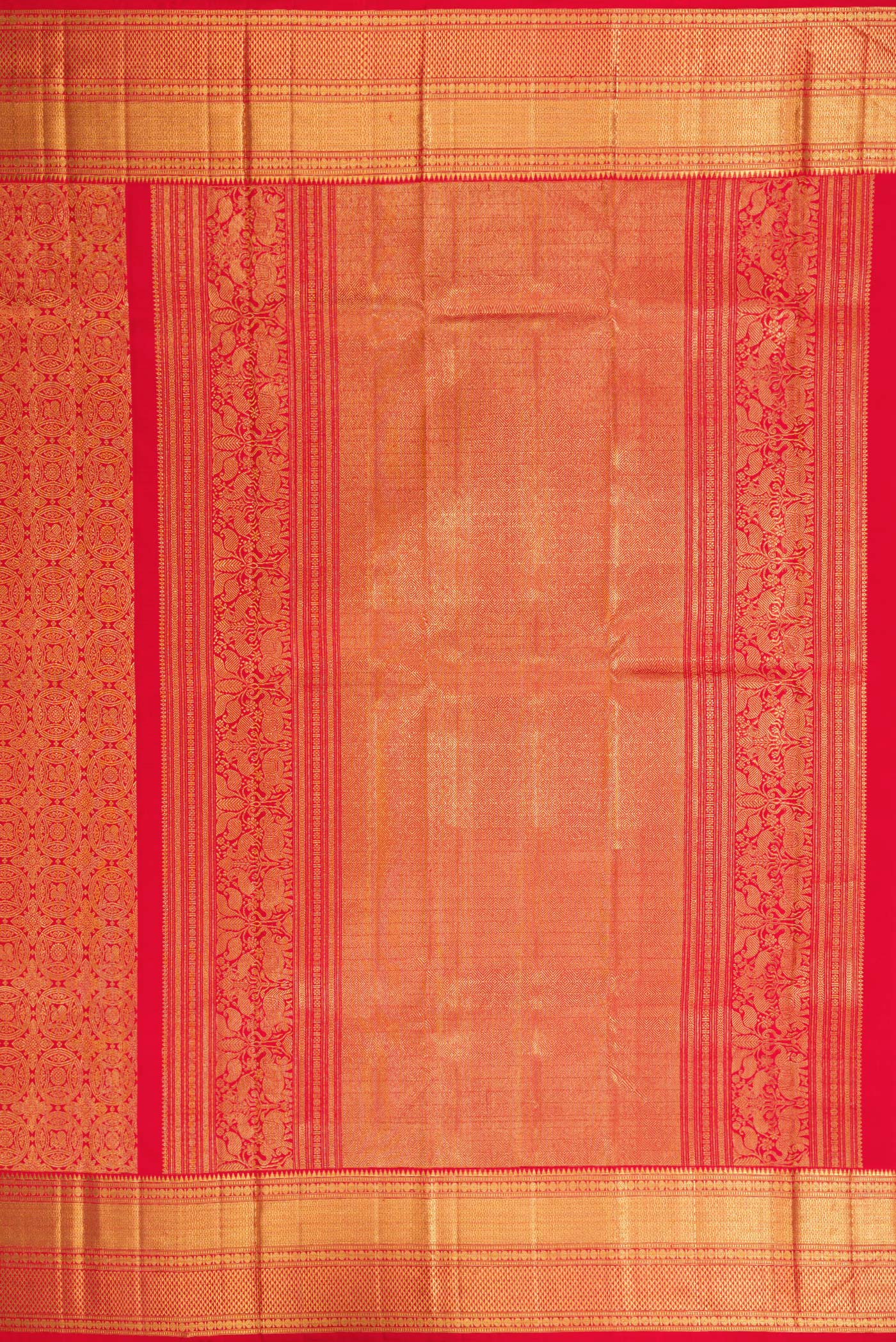 Close up image of the pallu of Red Dual Tone Kanchipuram Silk Saree with Zari Brocade on the body and Zari Border. 
