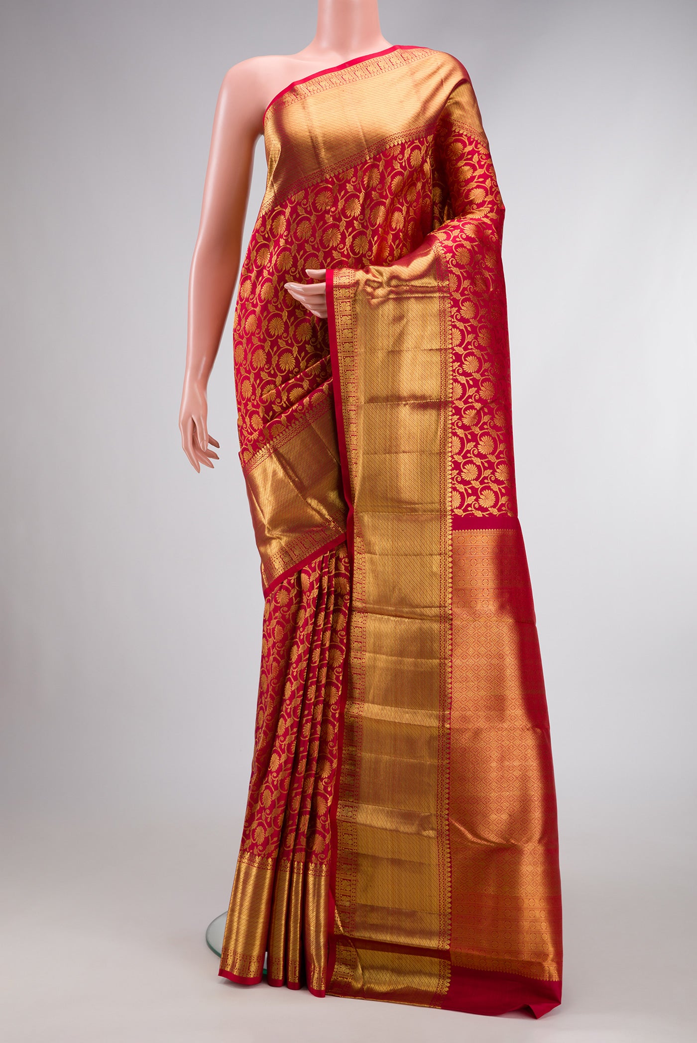 Maroon Dual Tone Kanchipuram Silk Saree with Zari Brocade on the body and Zari Border.  displayed on a mannequin