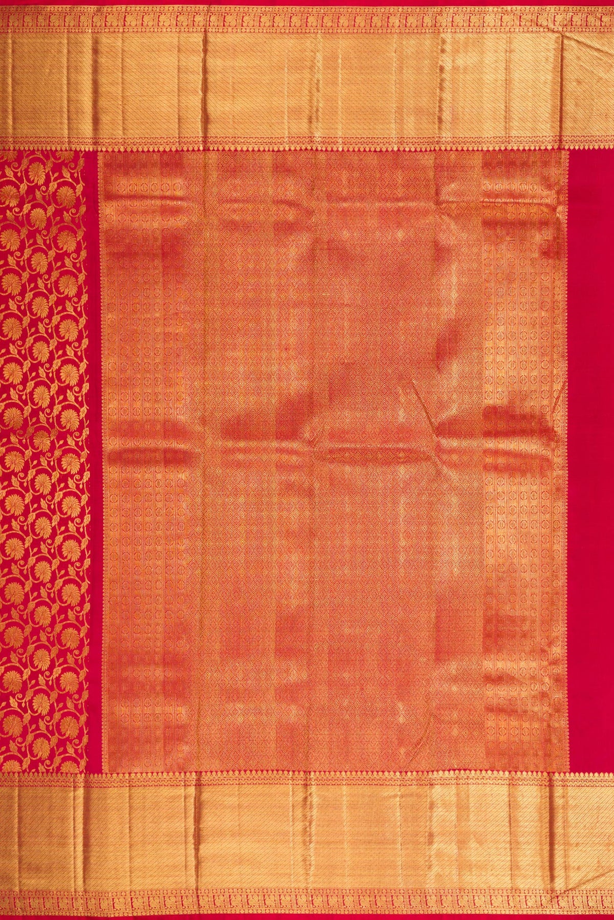 Close up image of the pallu of Maroon Dual Tone Kanchipuram Silk Saree with Zari Brocade on the body and Zari Border. 