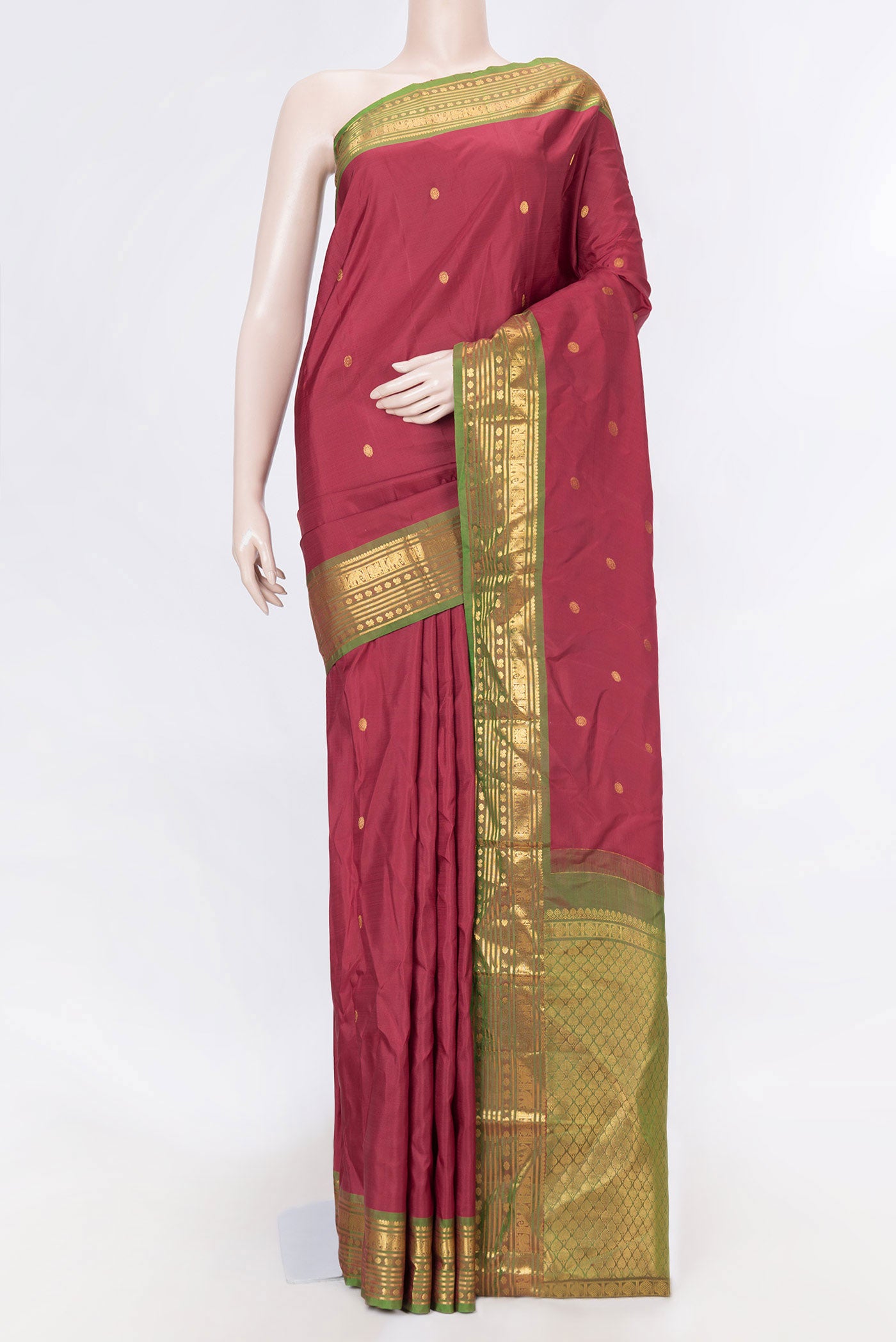 Maroon Dual Tone Kanchipuram Saree with Zari Butta on the body and Zari Border displayed on a mannequin