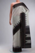 Grey Kanchipuram Silk Saree with Plain Body and Temple Border displayed on a mannequin