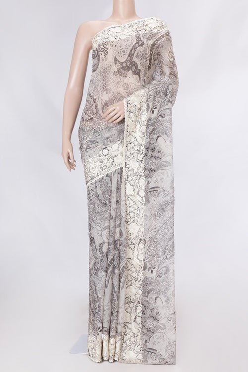 Beige Dual Tone Organza Silk Saree with Printed design on the body and Embroidery Border displayed on a mannequin