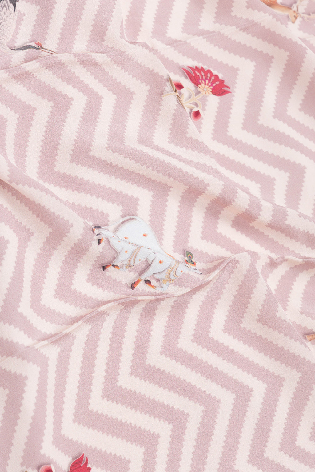 Close up of Pink Dual Tone Mysore Crepe Saree with Printed design on the body and Printed Border.  displaying folds